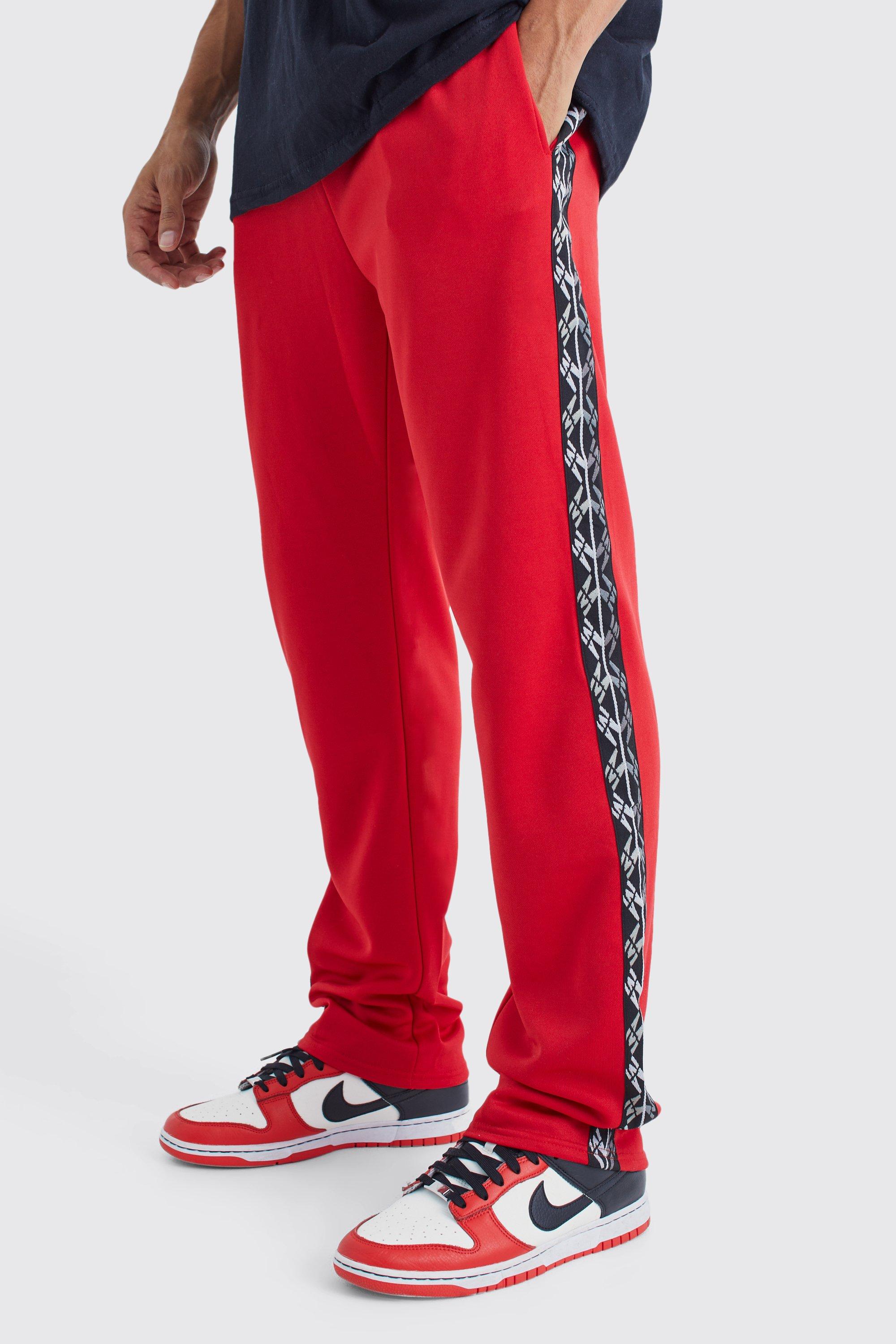 Image of Pantaloni tuta Regular Fit in tricot con striscia laterale, Rosso