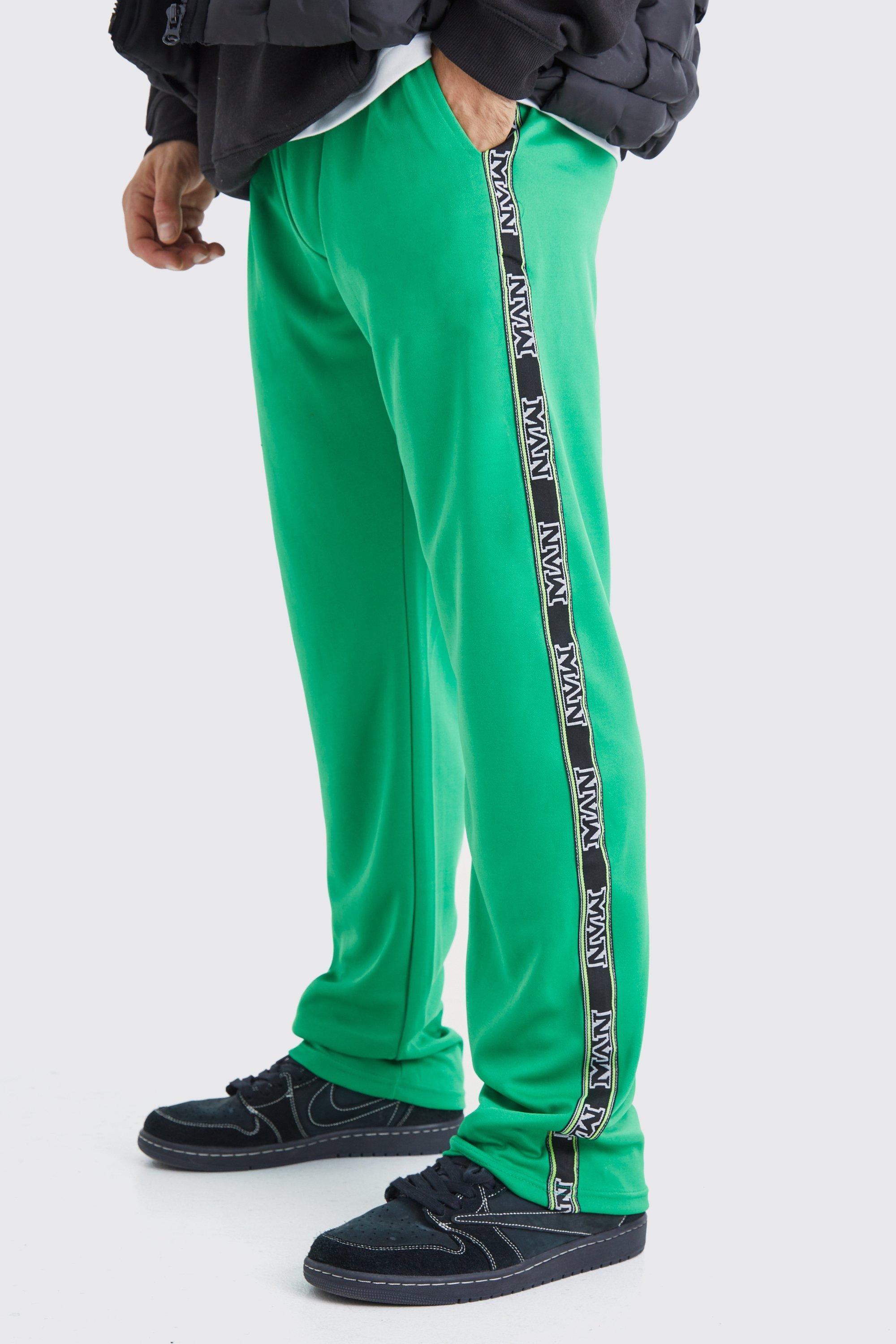 Image of Pantaloni tuta Regular Fit in tricot con striscia laterale, Verde