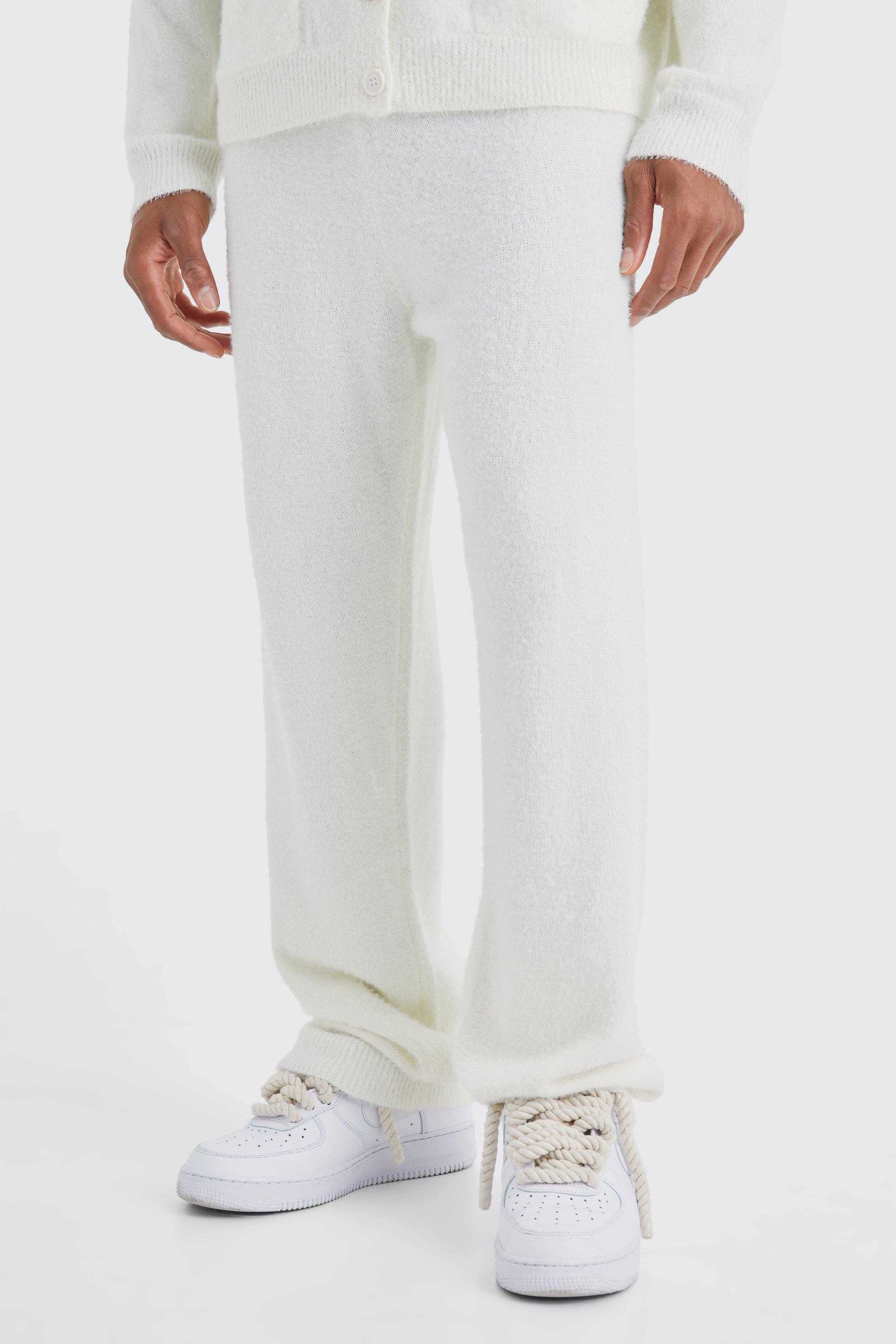 Image of Pantaloni tuta rilassati in maglia morbida, Cream