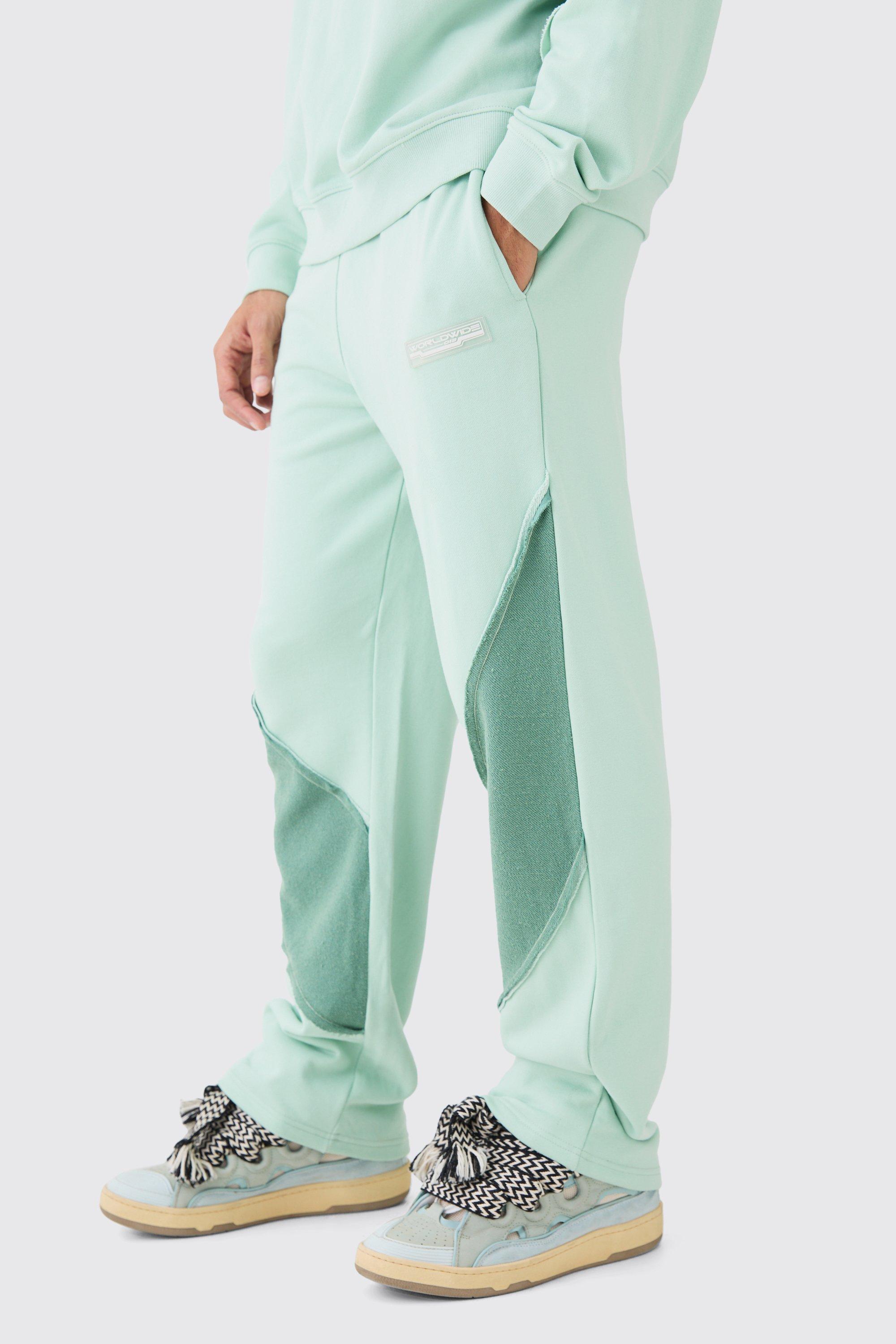 Image of Pantaloni tuta rilassati con pannelli arricciati sul retro e fondo grezzo, Verde
