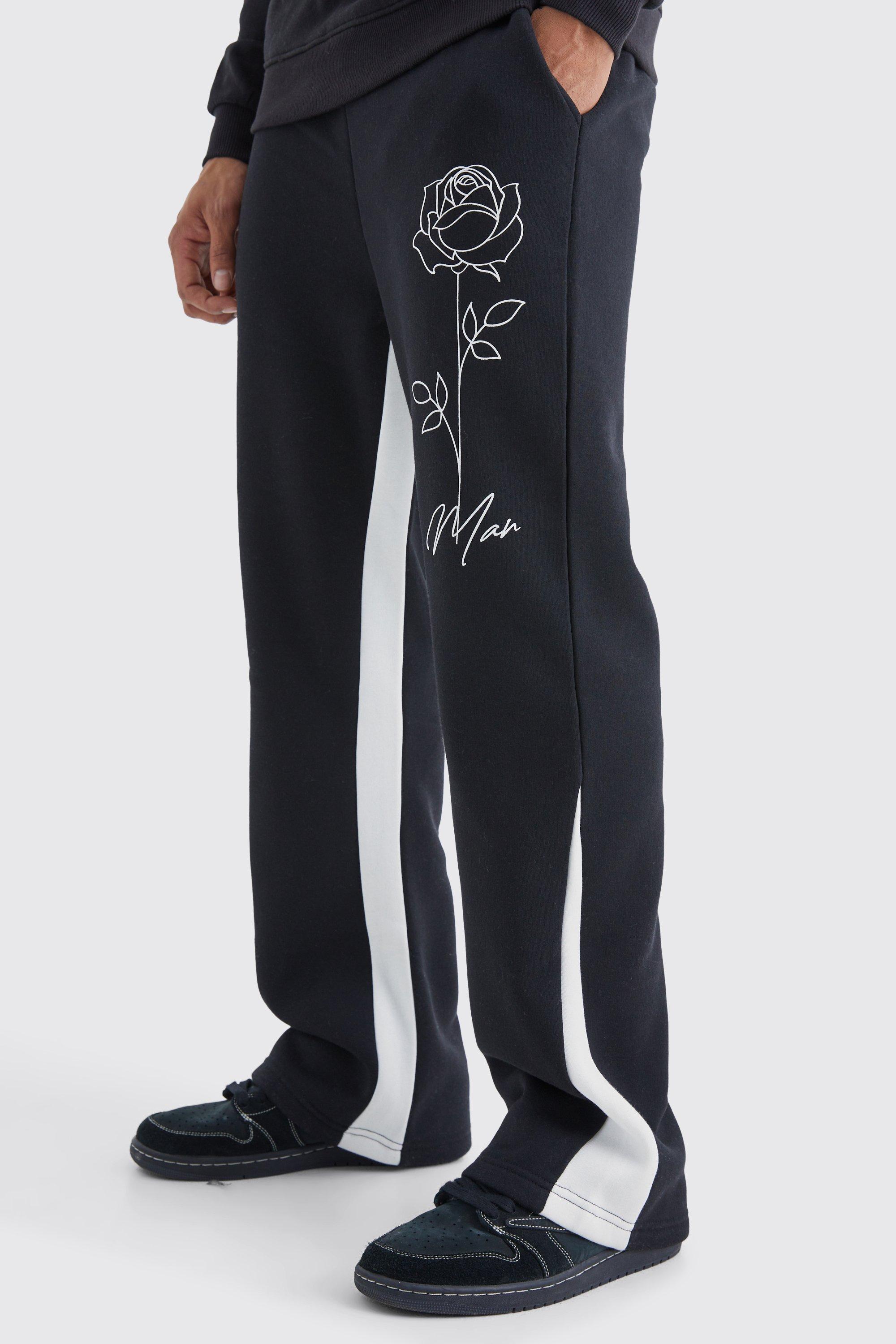 Image of Pantaloni tuta Man con stampa di rose e inserti, Nero