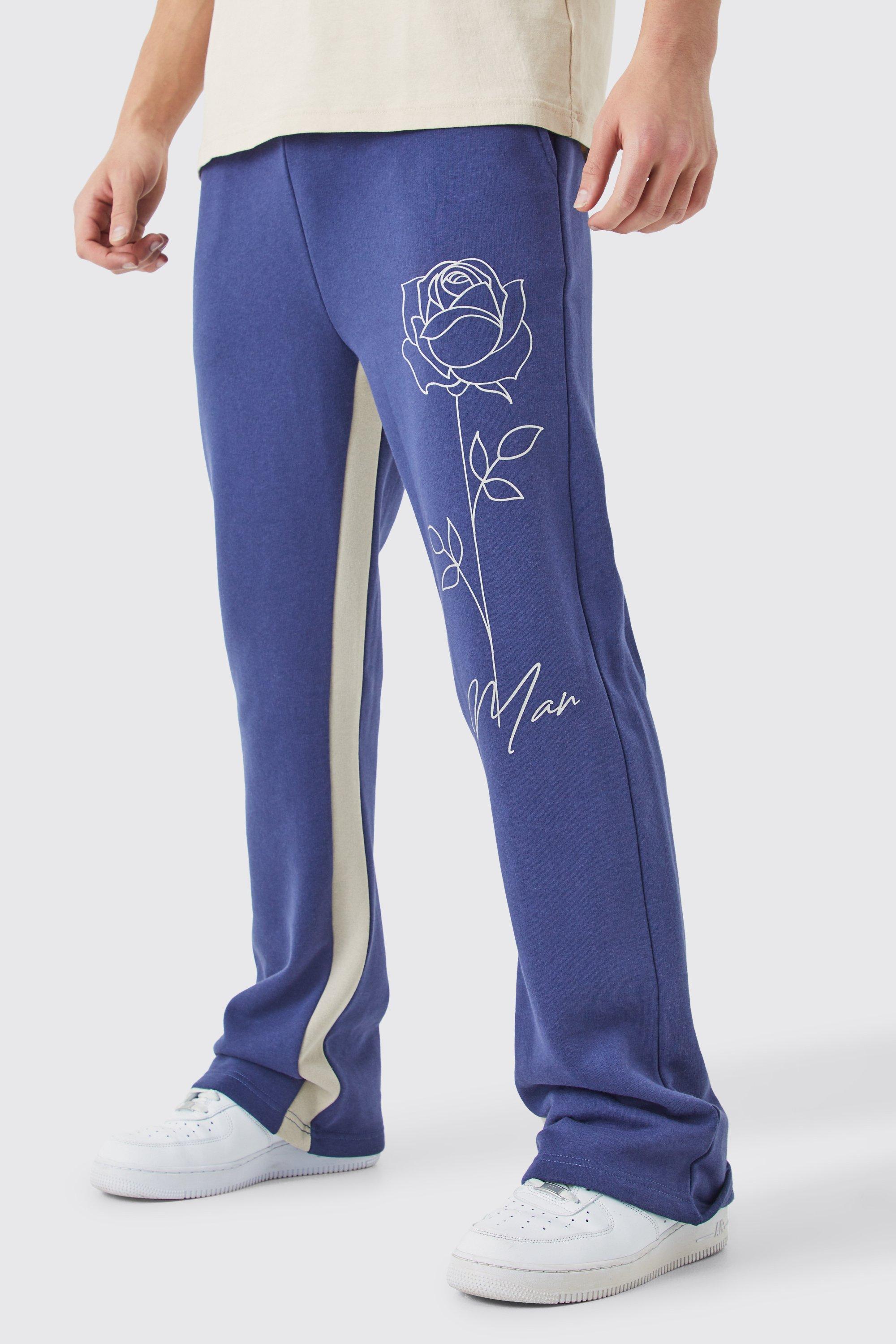 Image of Pantaloni tuta Man con stampa di rose e inserti, Azzurro
