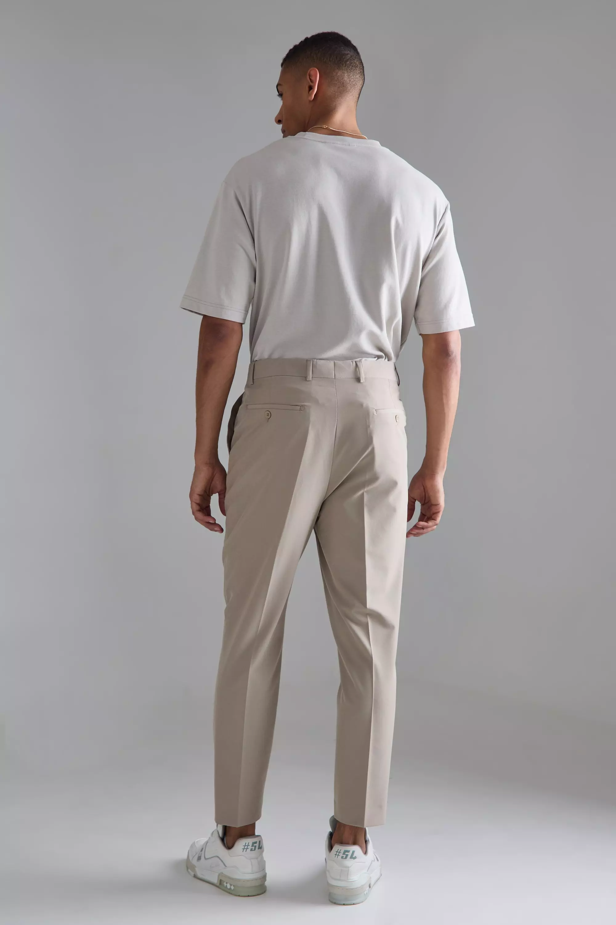 boohooMAN tapered chinos with side panel detail in khaki