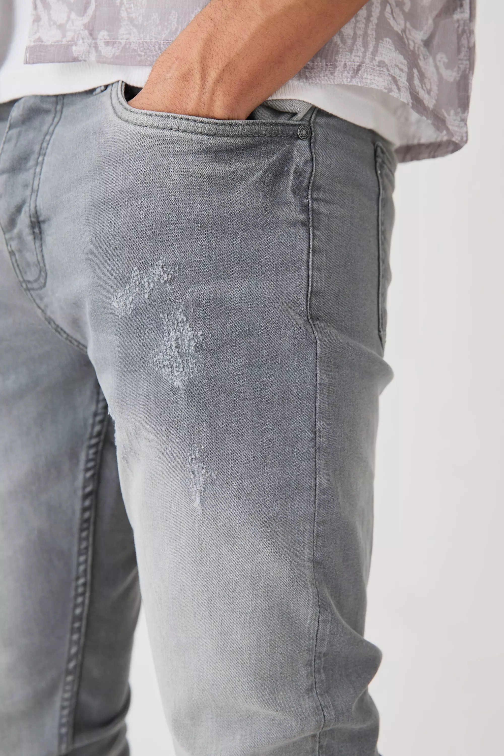 Ripped Paint Splatter Stretch Skinny Jeans