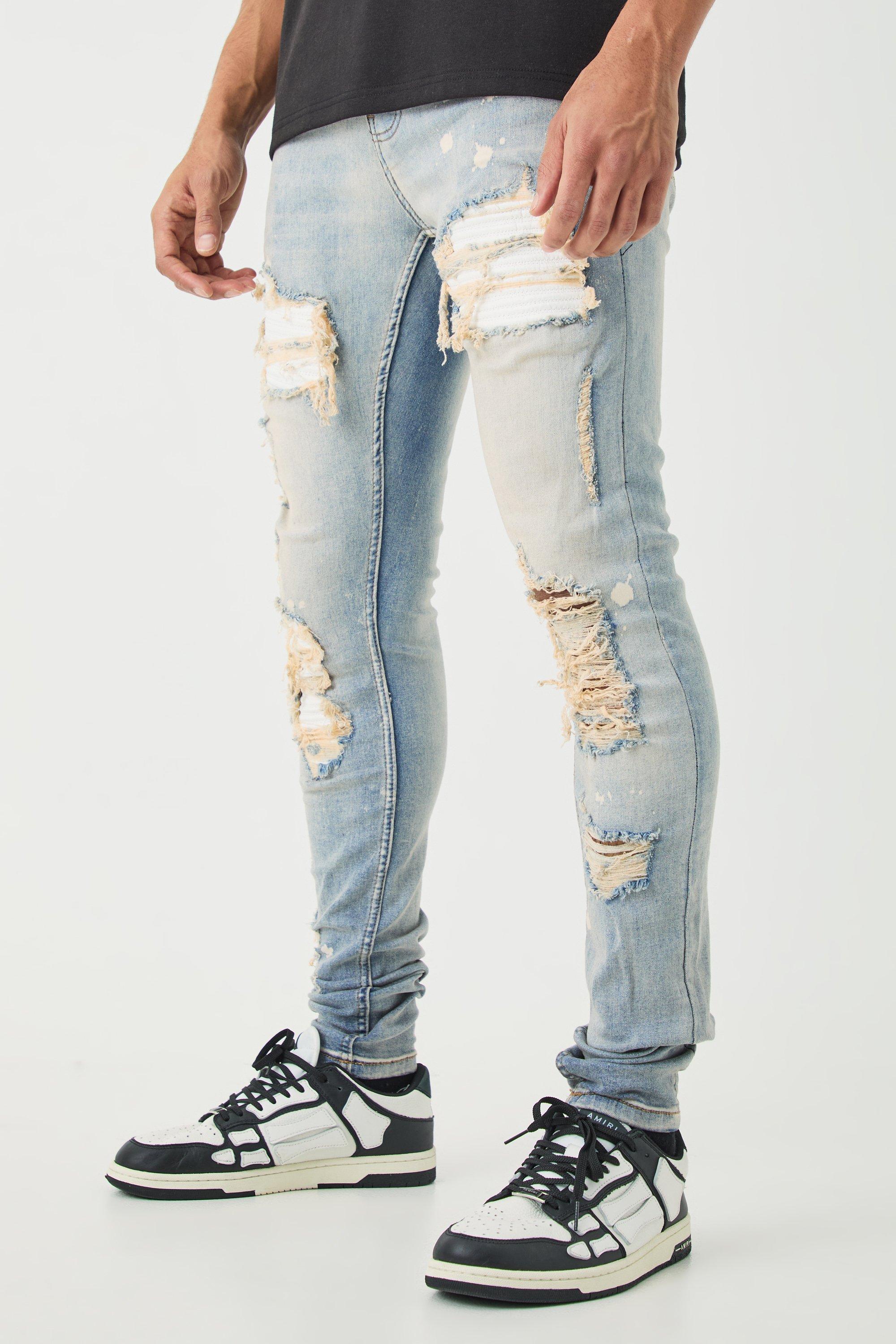 Image of Jeans stile Biker Skinny Fit Stretch bianchi in PU con pieghe sul fondo e strappi & rattoppi, Azzurro