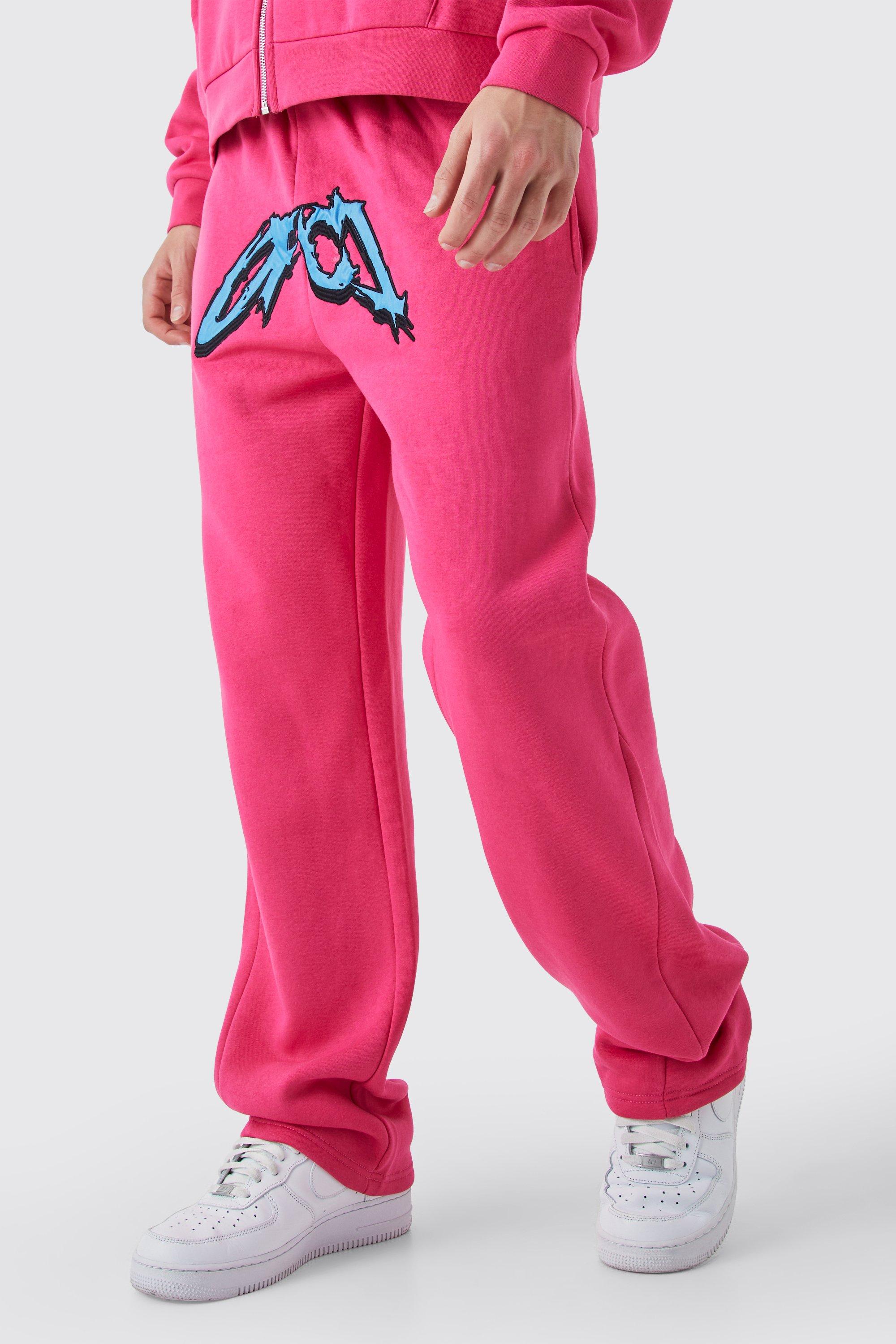 Image of Pantaloni tuta rilassati in raso Ofcl con inserti, Pink