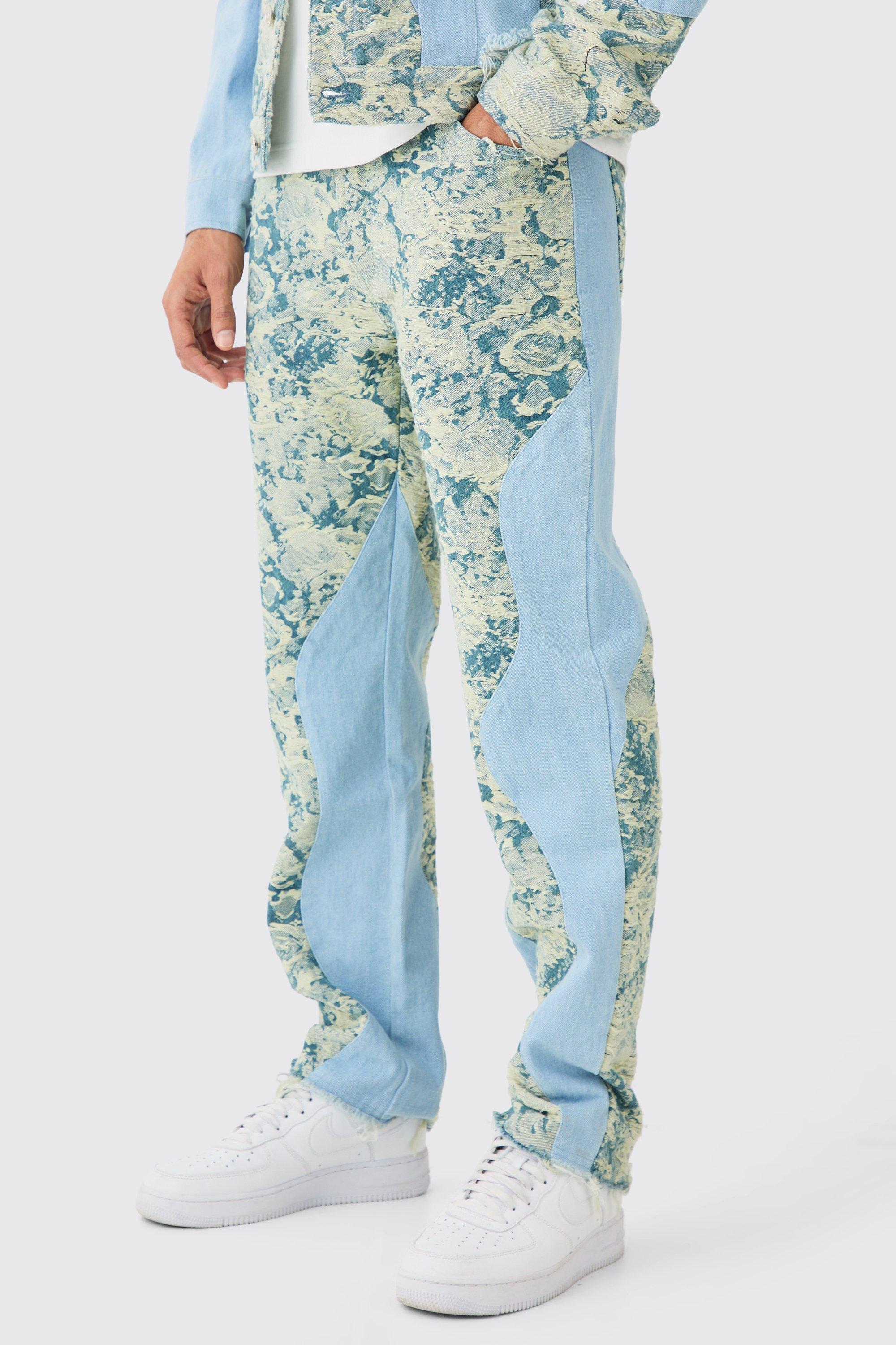 Image of Jeans rilassati in denim rigido effetto smagliato effetto patchwork, Azzurro