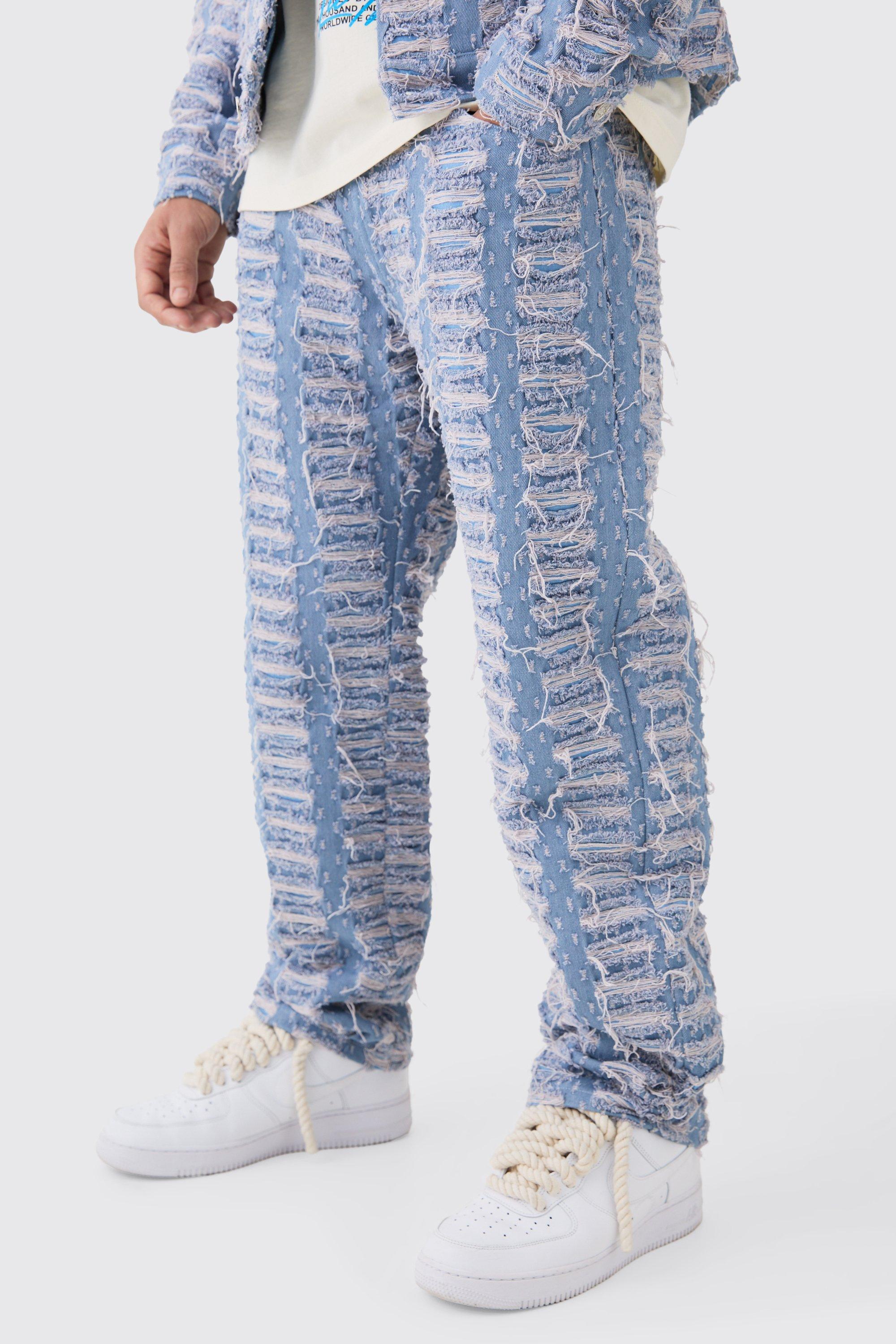 Image of Jeans rilassati in denim rigido con smagliature all over, Azzurro