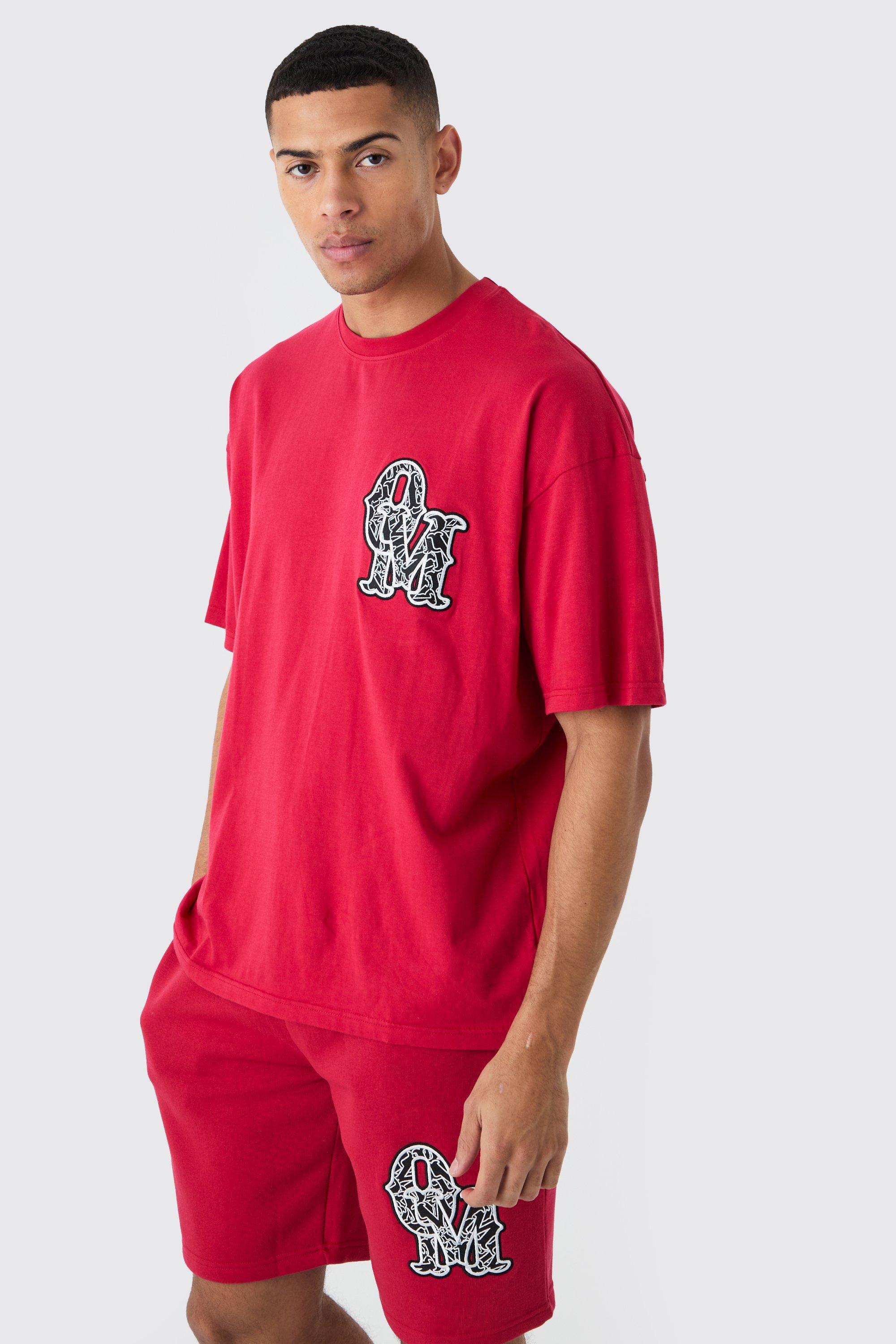 Image of Set T-shirt oversize con applique & pantaloncini, Rosso