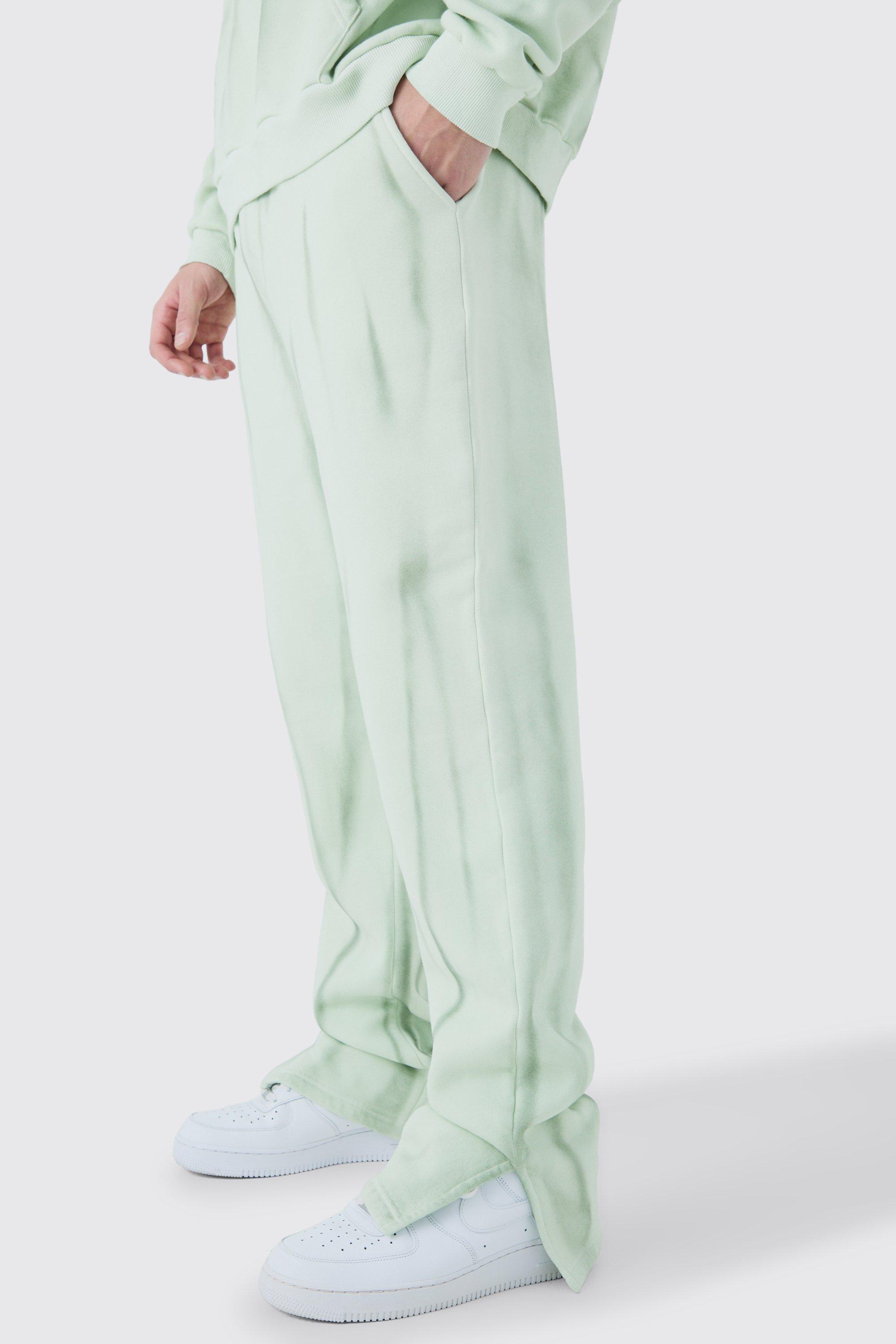Image of Pantaloni tuta Regular Fit in lavaggio spray sfumato con spacco sul fondo, Verde