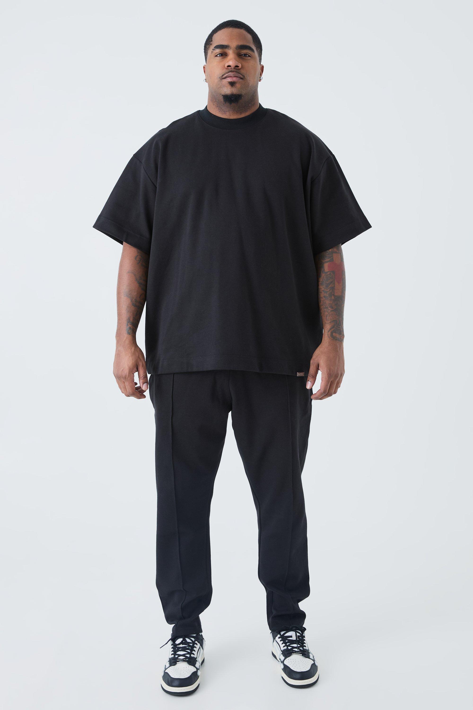 Image of Set Plus Size T-shirt oversize & pantaloni tuta affusolati in maglia intrecciata, Nero