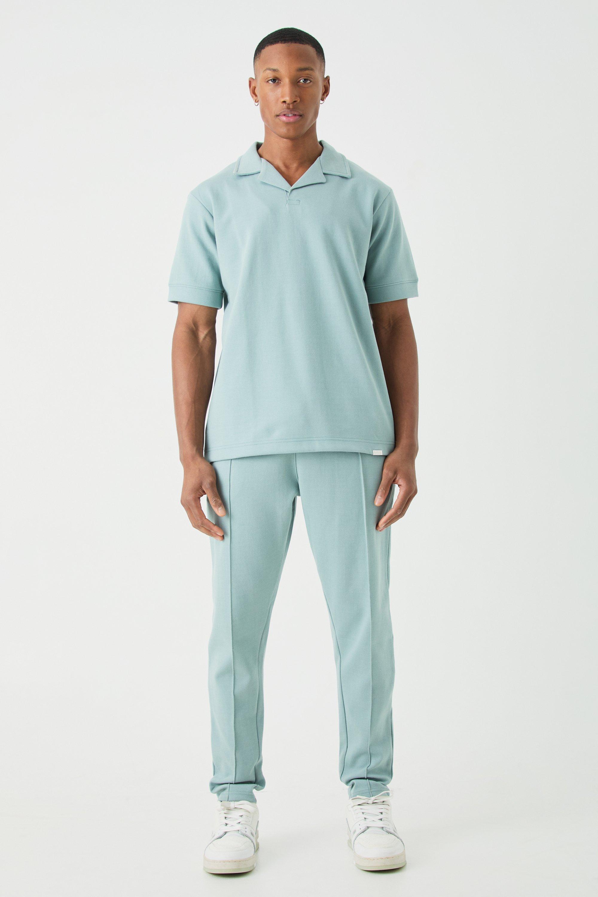 Image of Set polo Core con rever & pantaloni tuta affusolati in maglia intrecciata, Azzurro