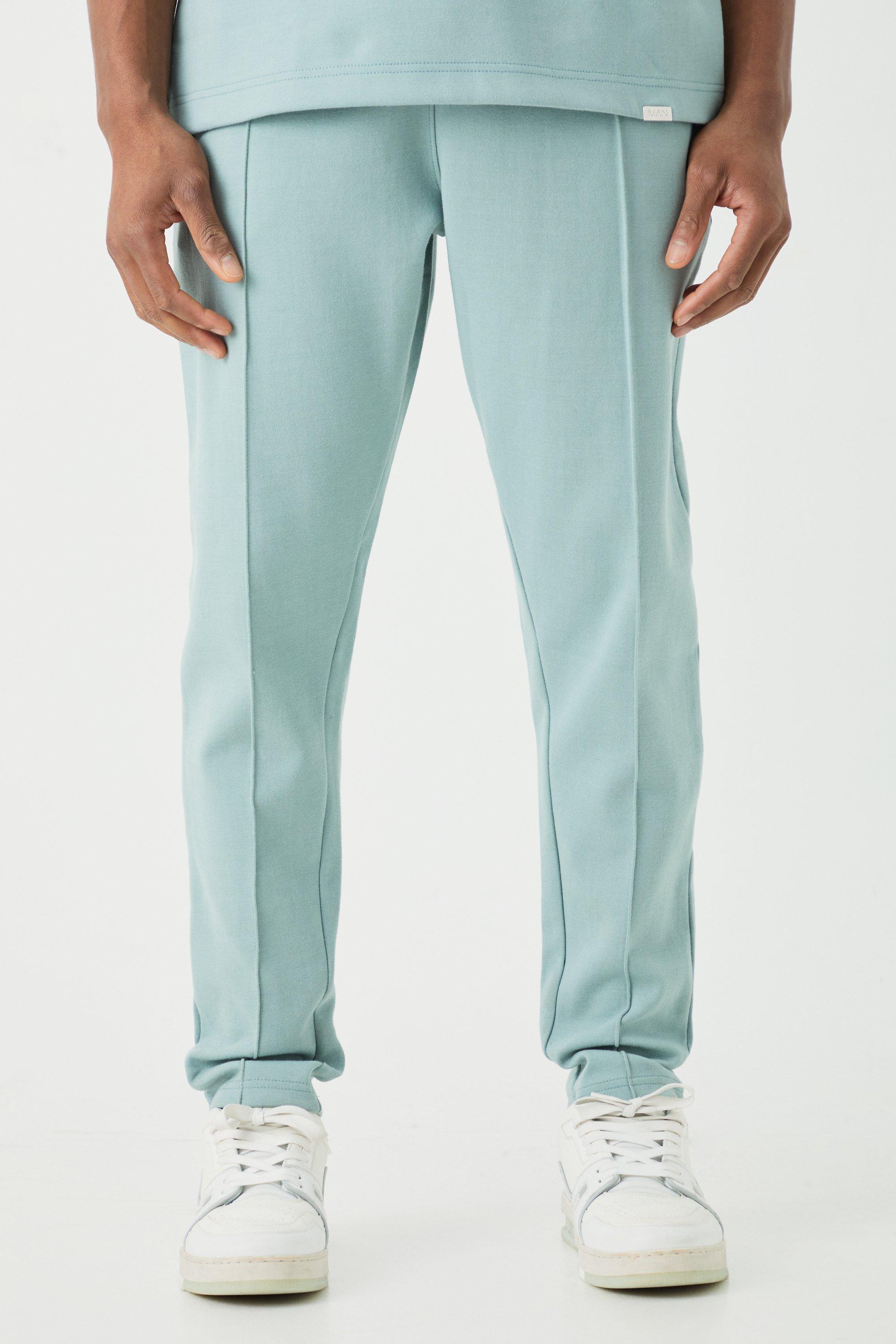 Image of Pantaloni tuta affusolati Slim Fit con nervature e nervature, Azzurro
