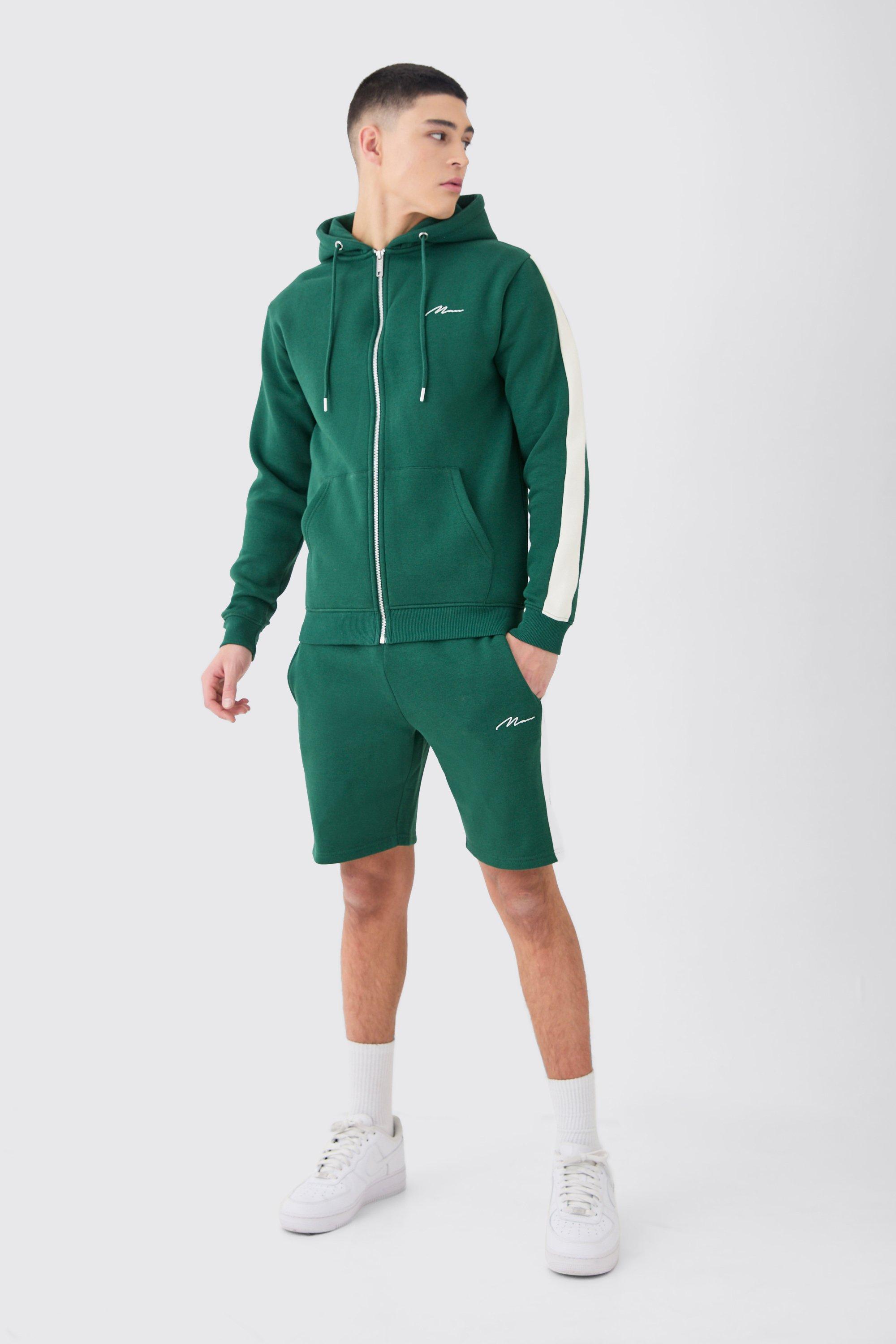 Image of Tuta sportiva corta a blocchi di colore Slim Fit con zip e firma Man, Verde