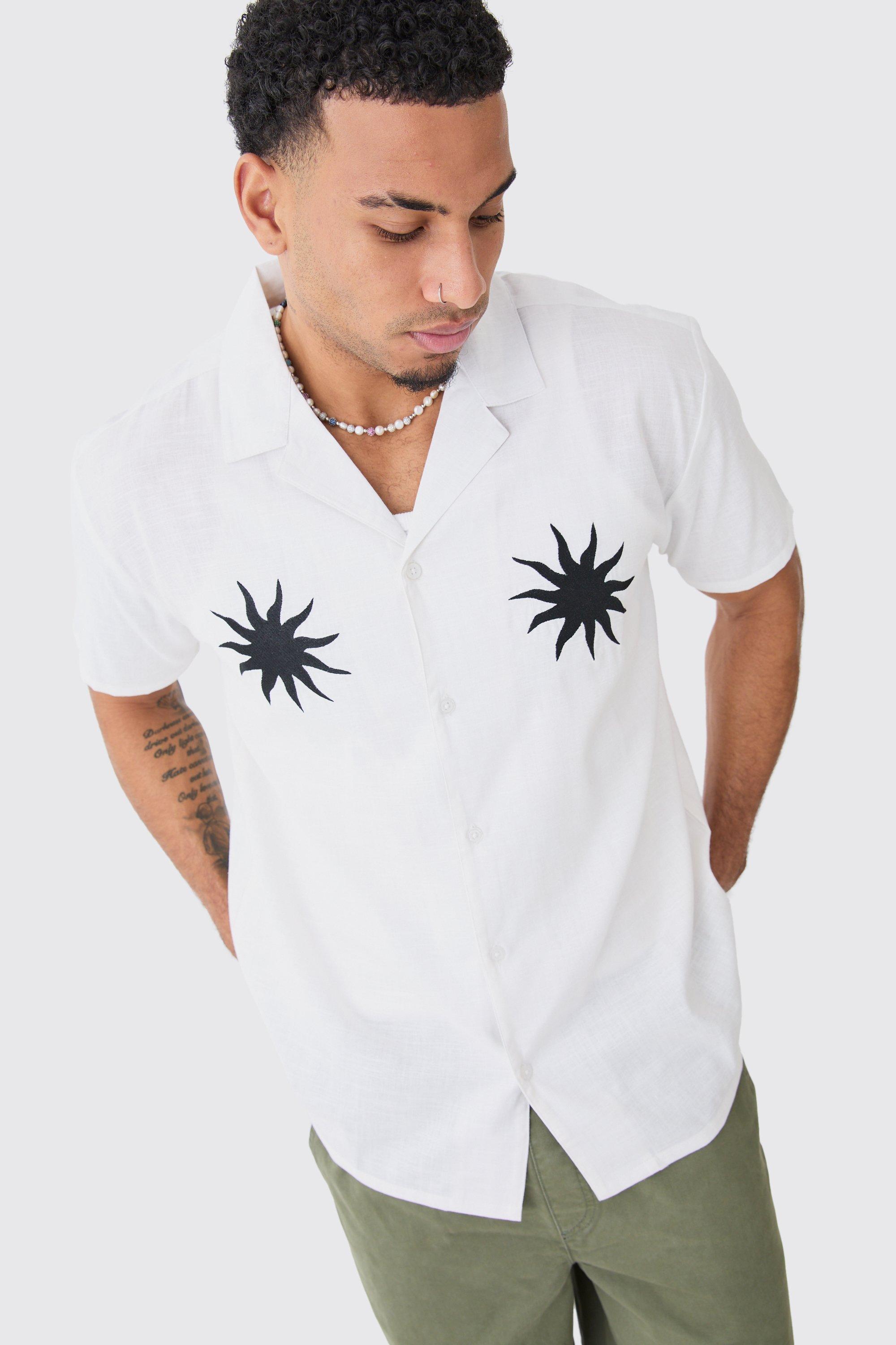 Image of Camicia oversize effetto lino con ricamo di sole, Bianco