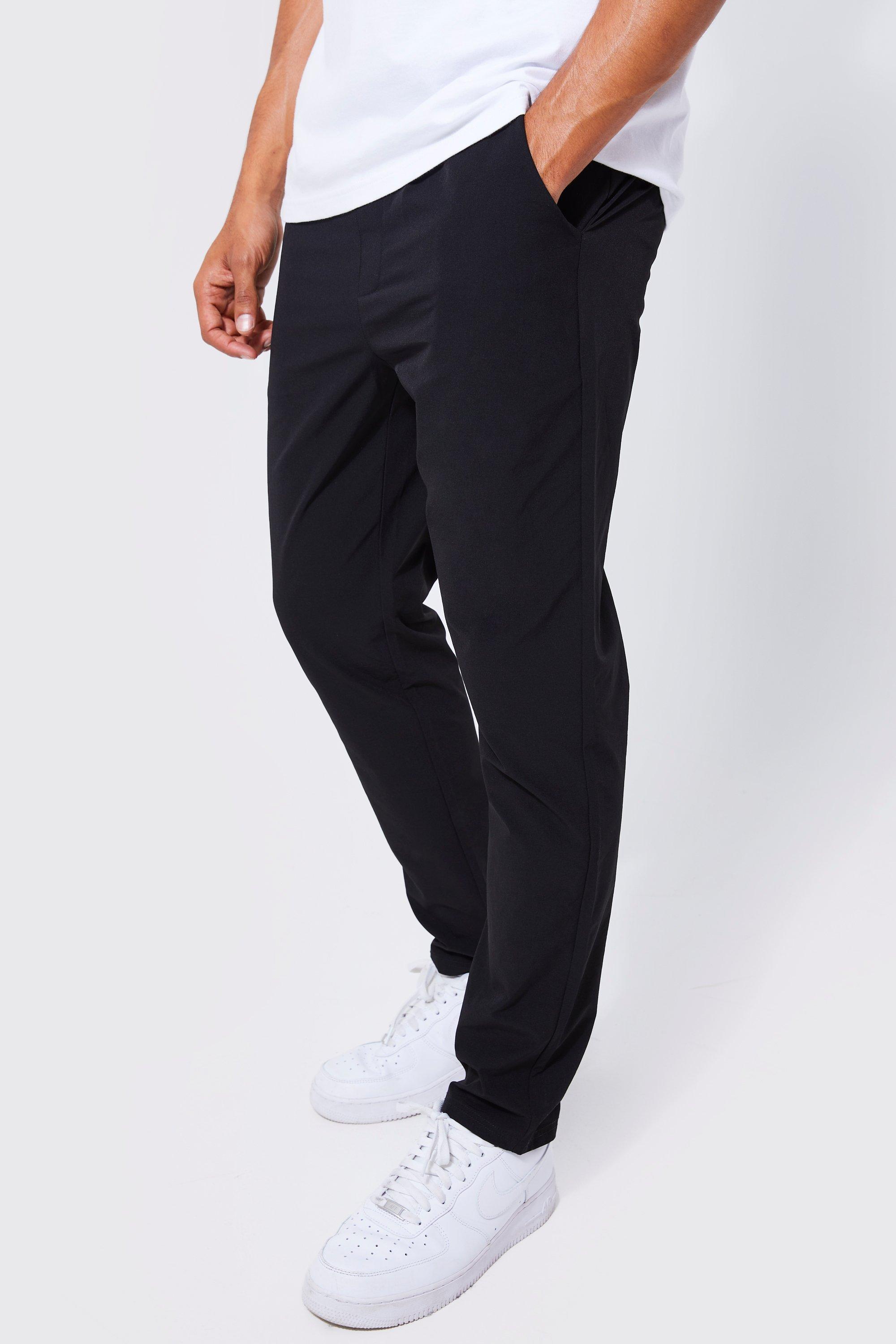 Image of Pantaloni Slim Fit in Stretch tecnico leggero con vita elasticizzata, Nero