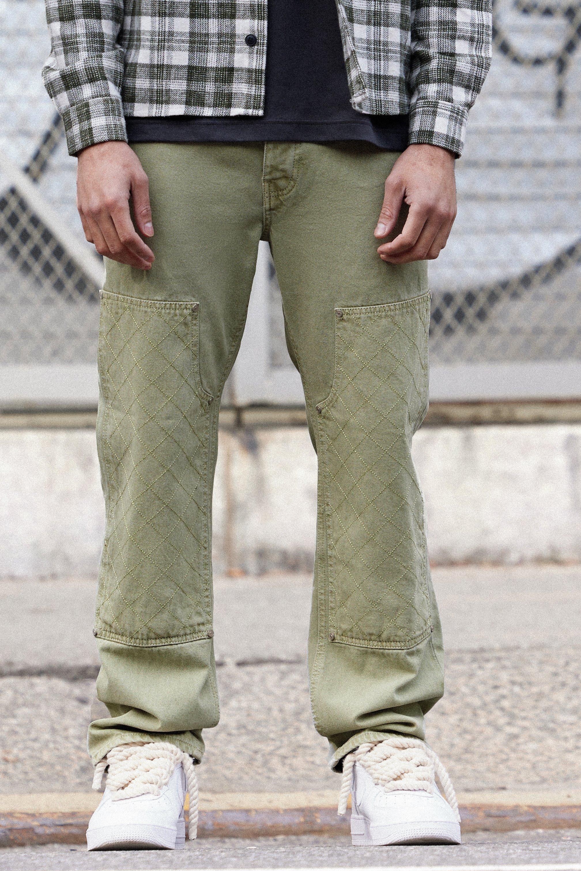 Image of Jeans rilassati in denim rigido sovratinti con cuciture, Verde