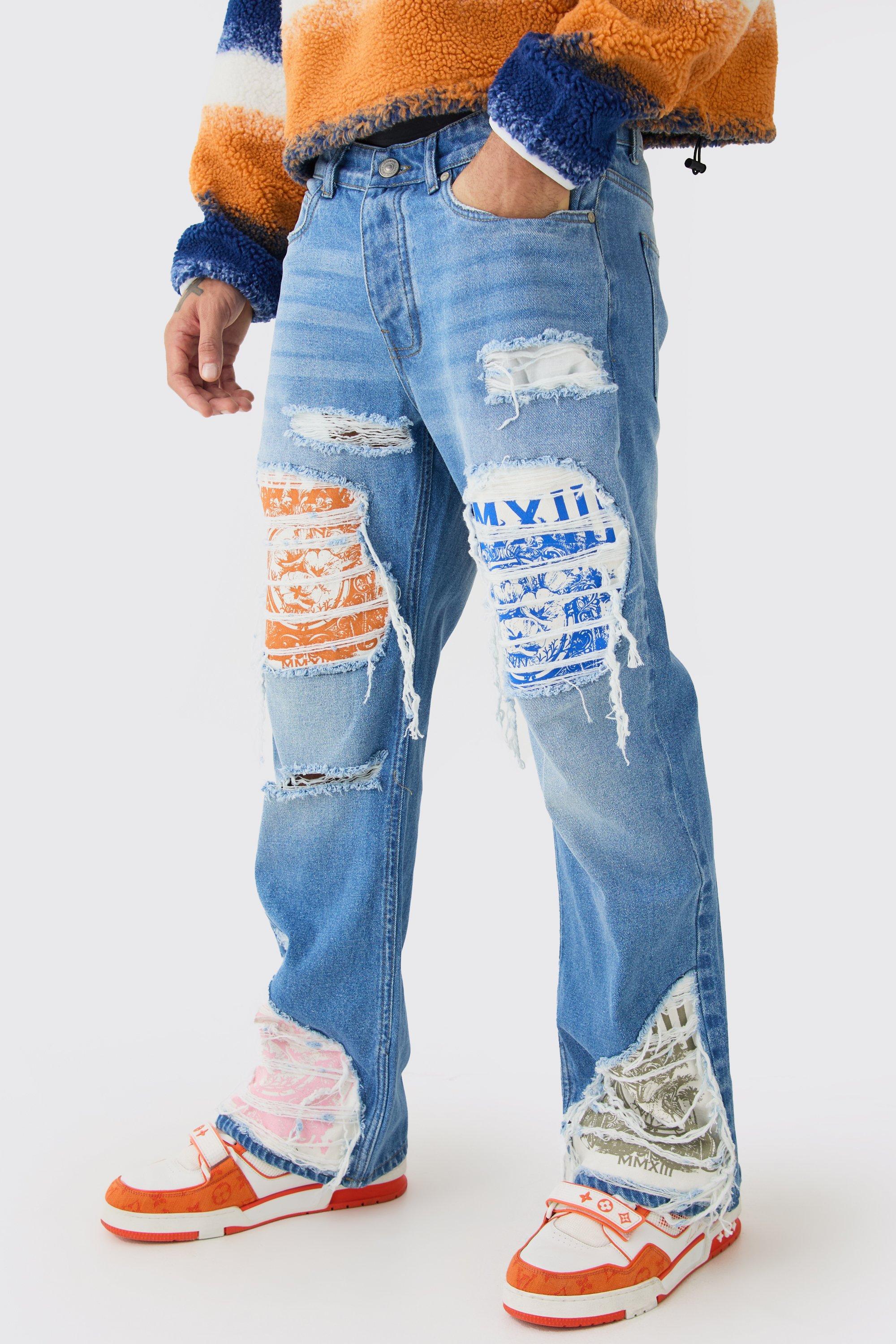 Image of Jeans a zampa in denim rigido rilassati con applique e strappi & rattoppi, Azzurro