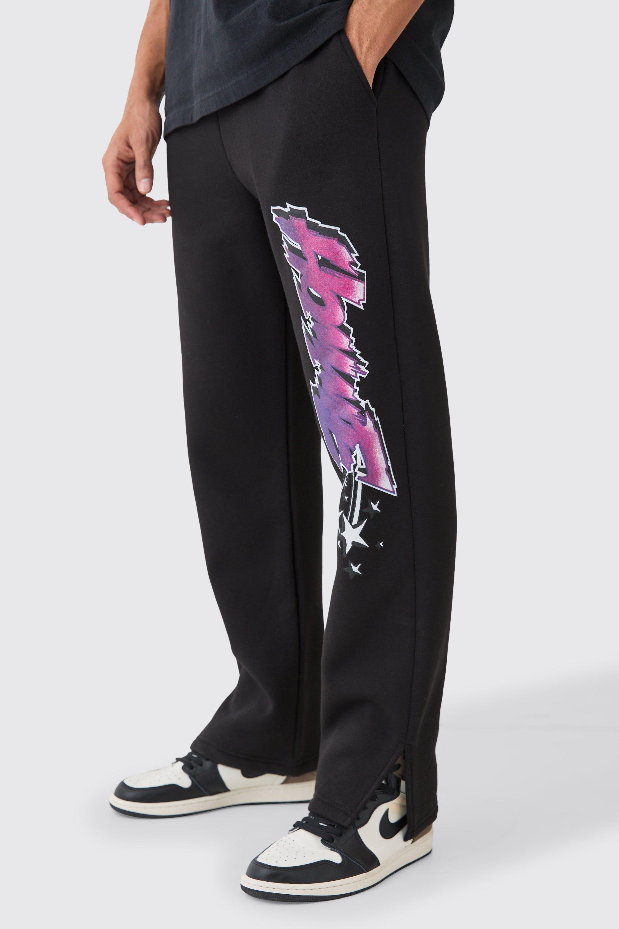 Image of Pantaloni tuta Core con grafica Homme e spacco sul fondo, Nero