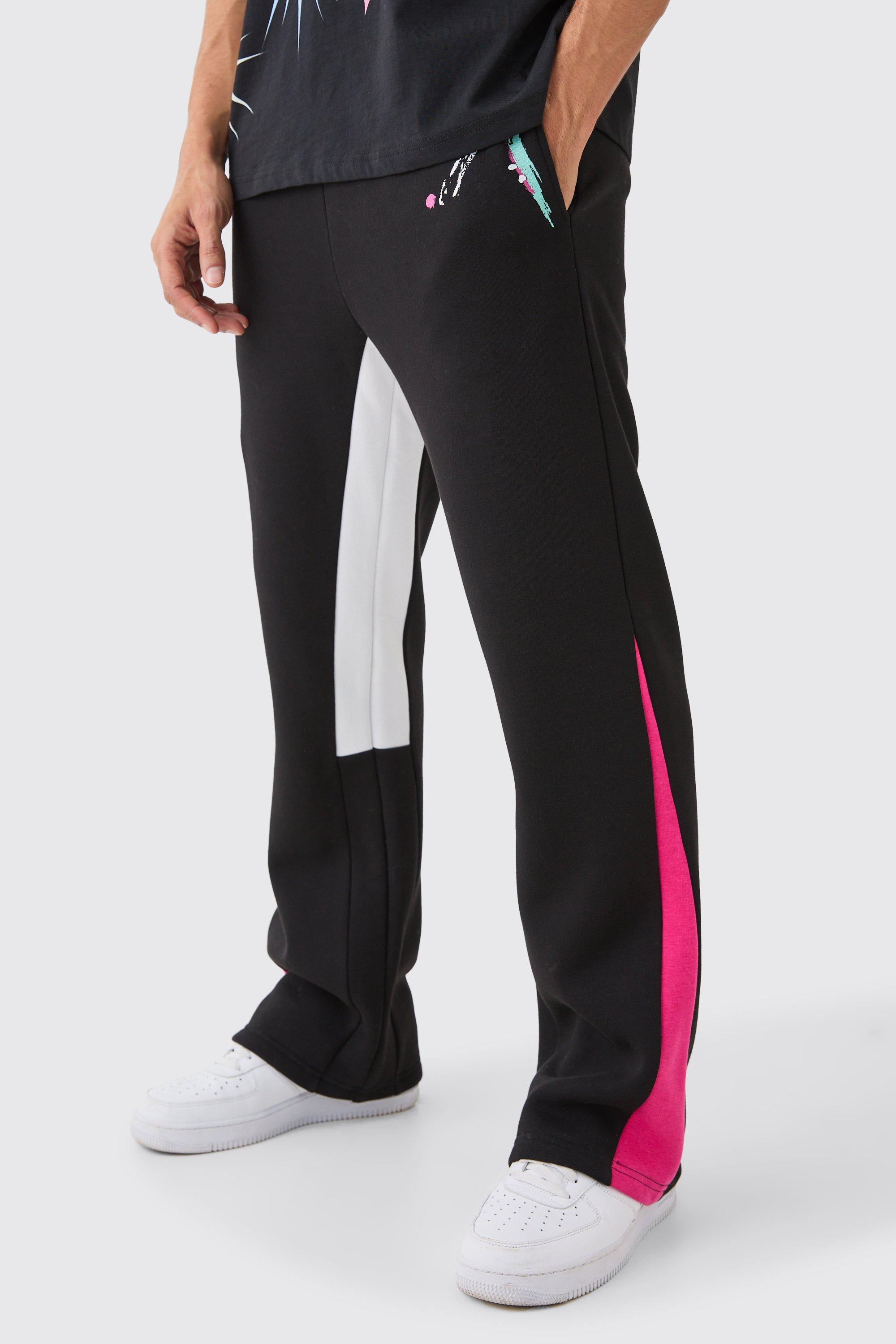 Image of Pantaloni tuta Core con inserti e schizzi di colore, Nero