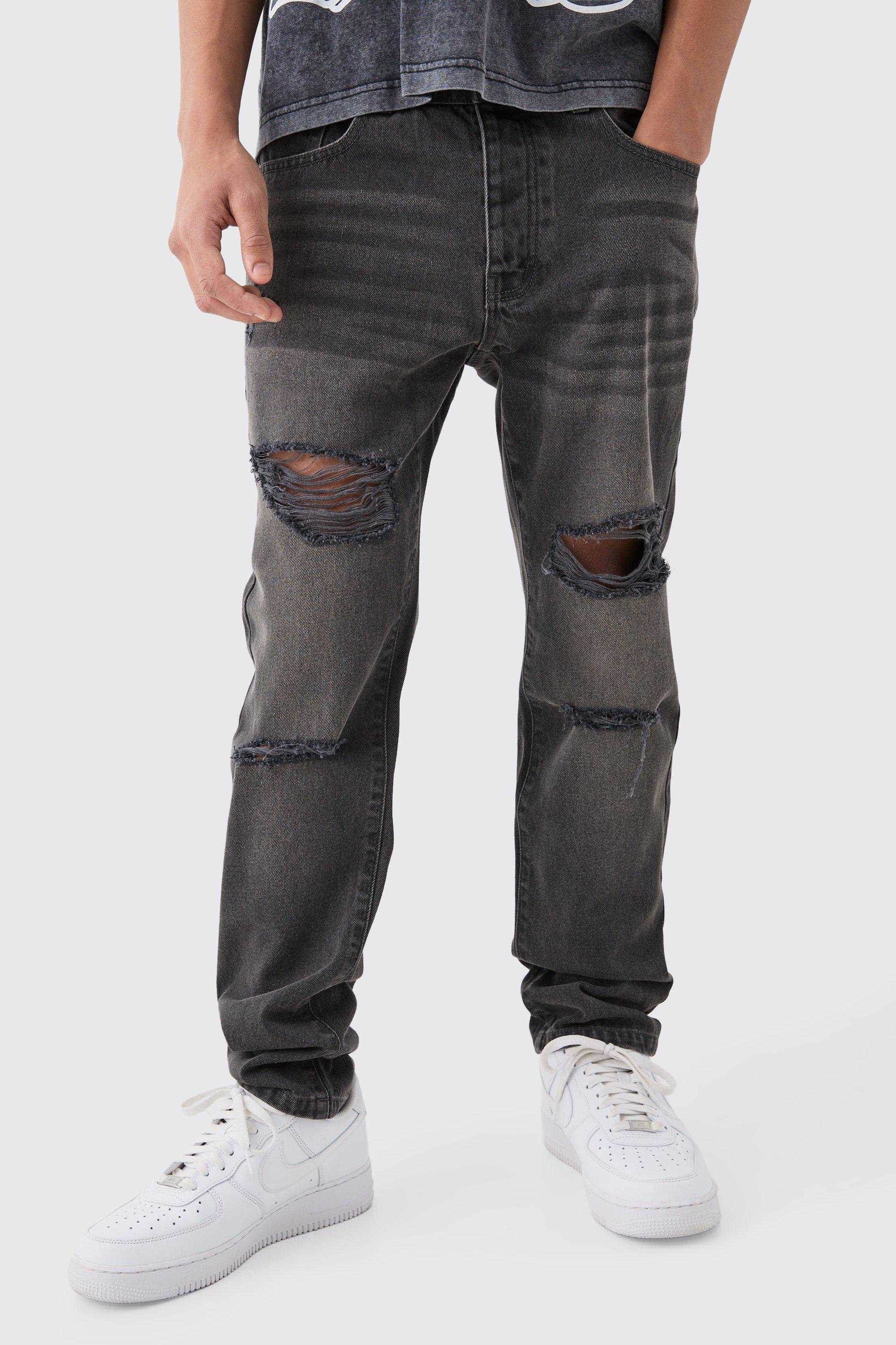 Image of Jeans Slim Fit in denim rigido color antracite con strappi all over, Grigio