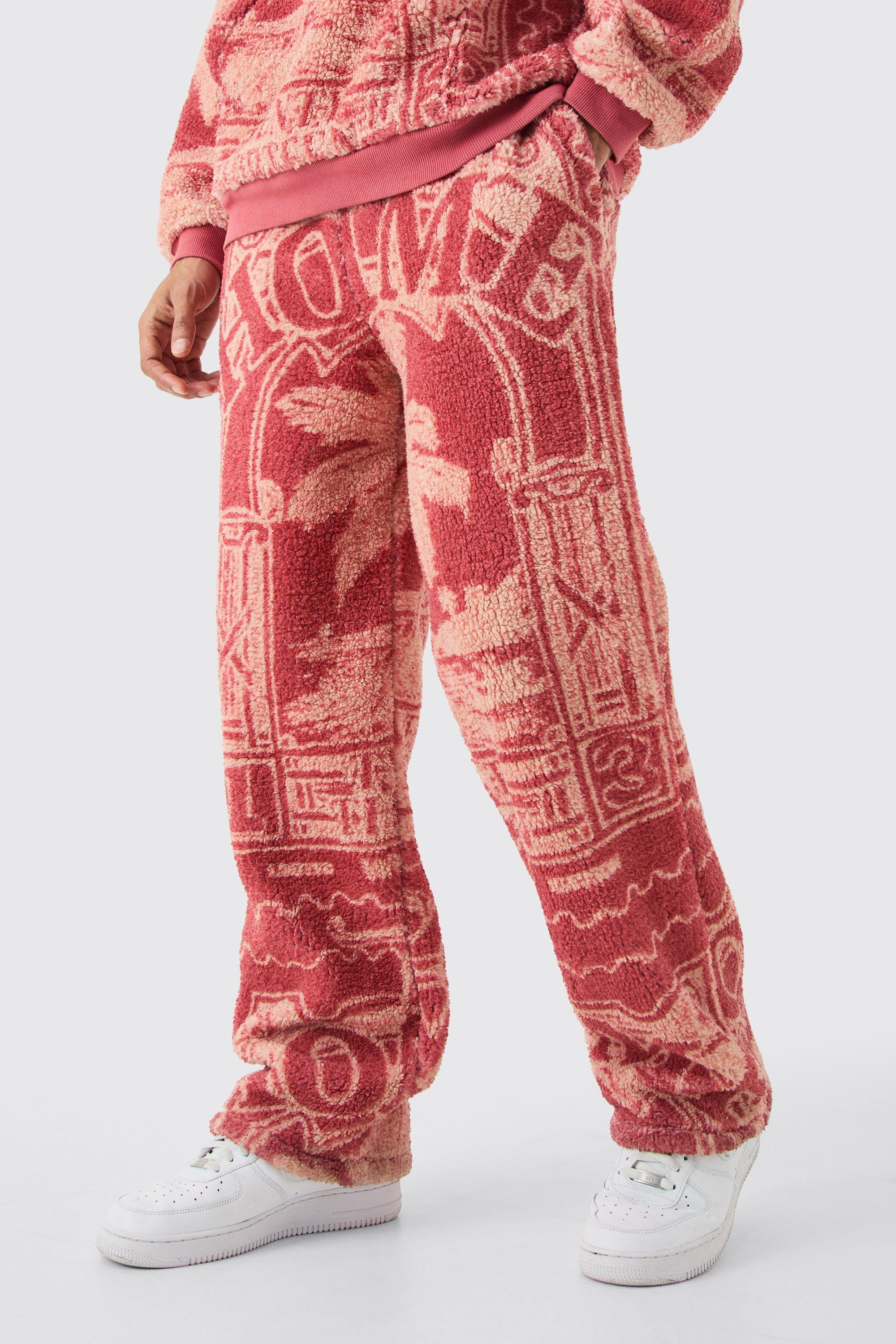 Image of Pantaloni tuta rilassati con stampa in pile borg, Rosso