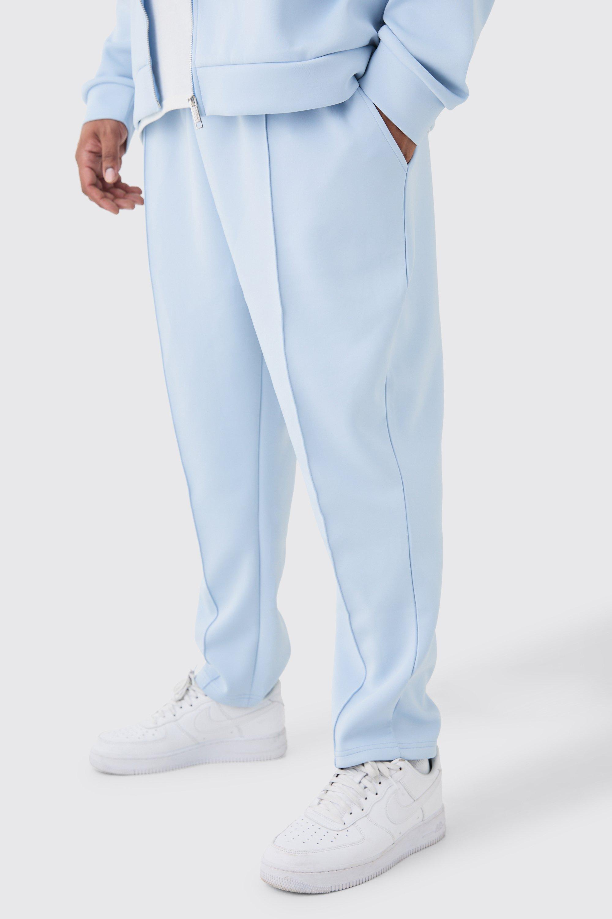 Image of Pantaloni tuta Plus Size affusolati alla caviglia in Scuba, Azzurro