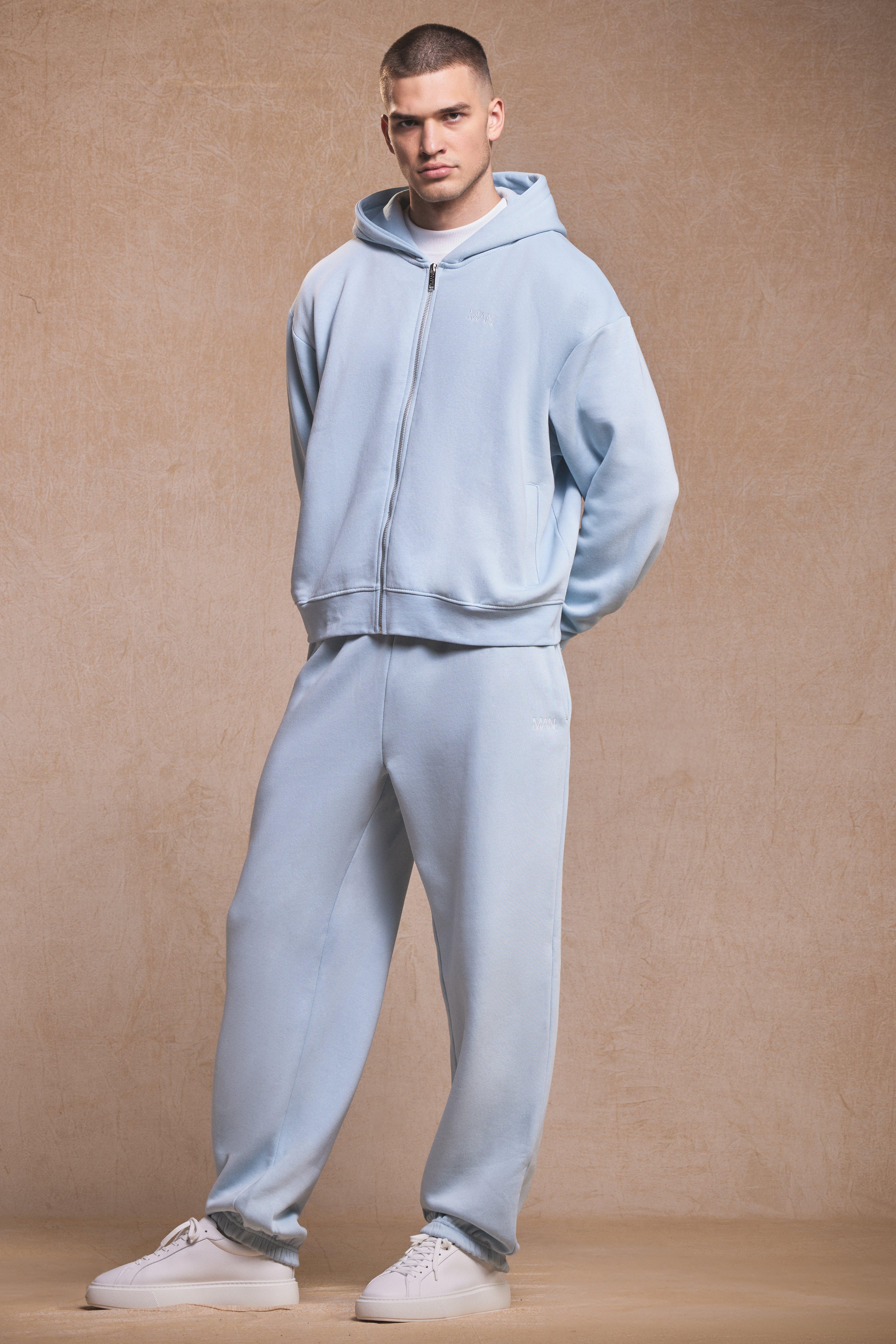 Image of Tuta sportiva Man oversize con zip e cappuccio, Azzurro