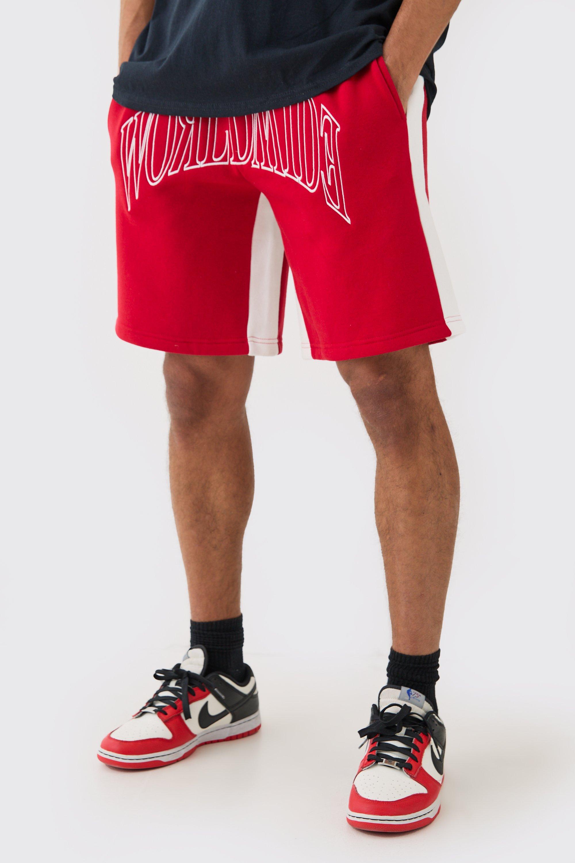 Image of Pantaloncini oversize Worldwide con cuciture a contrasto e inserti, Rosso
