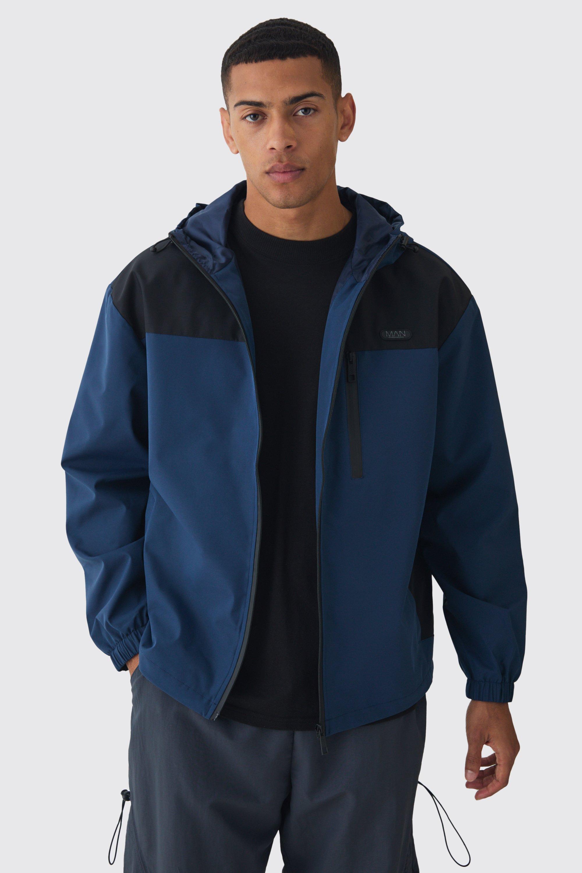 Giacca a vento oversize blu navy a blocchi di colore con etichetta Man e cappuccio, Navy