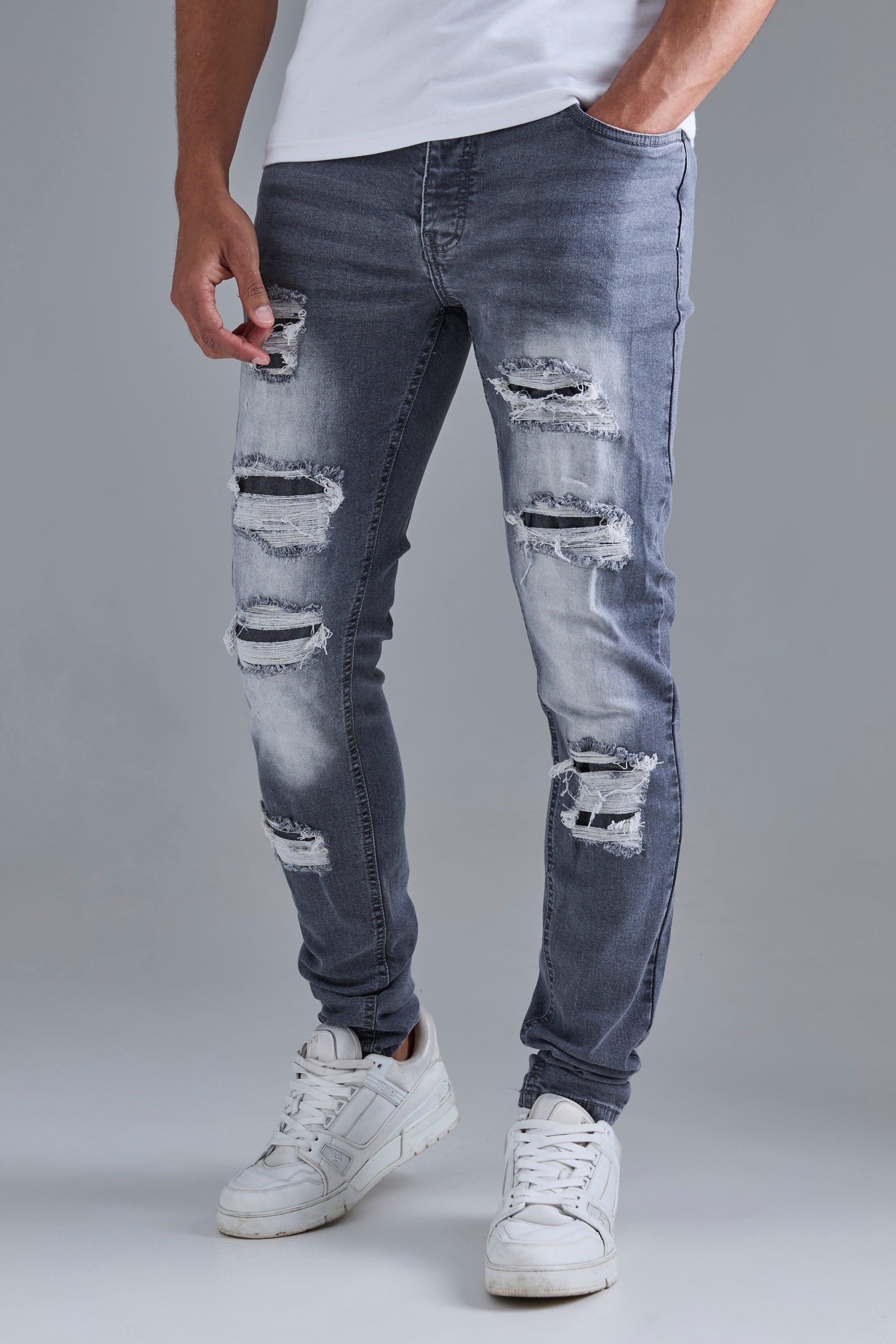 Image of Skinny Stacked Distressed Ripped Jeans In Grey, Grigio