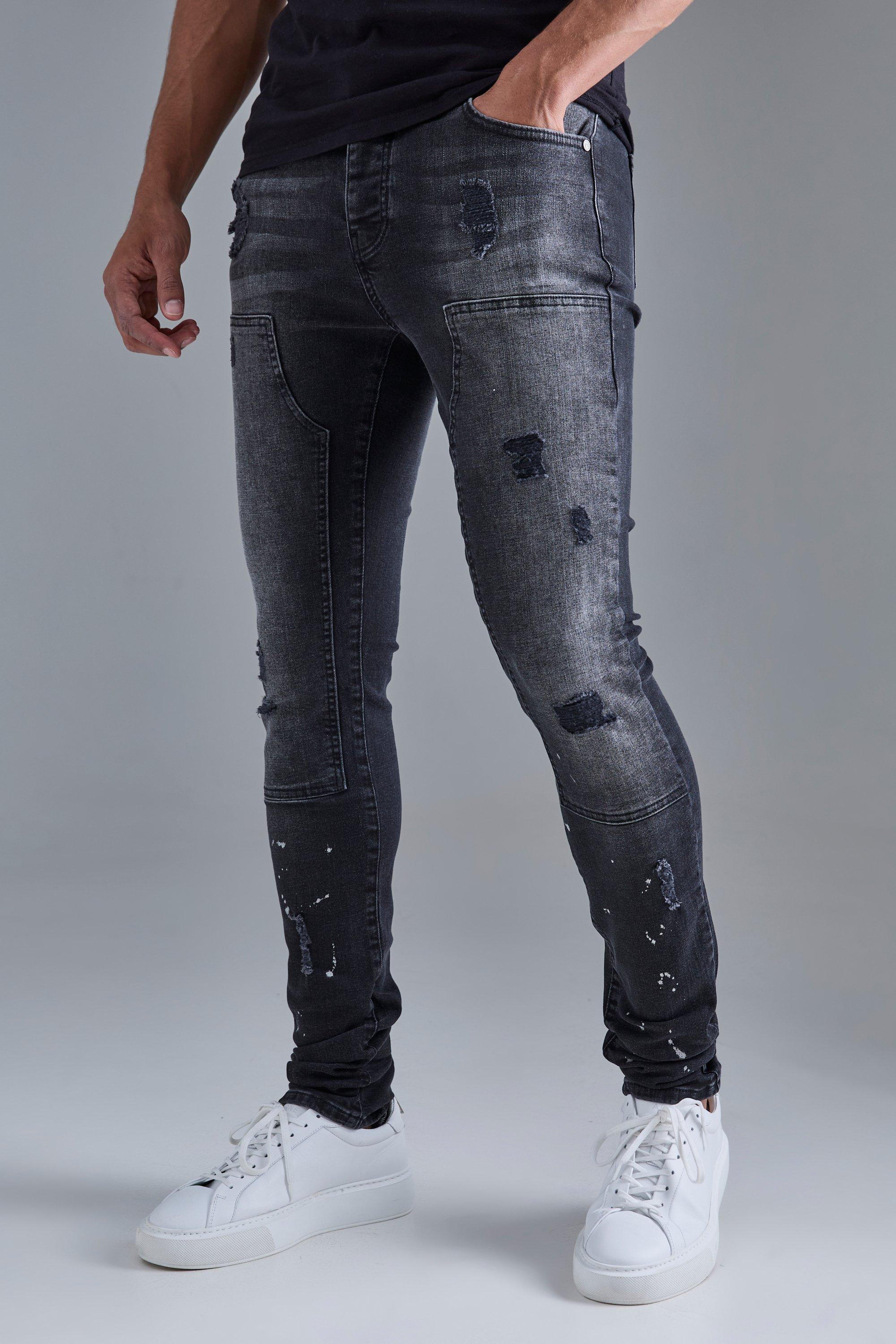 Image of Skinny Stretch Stacked Ripped Carpenter Zip Hem Jeans In Black, Nero