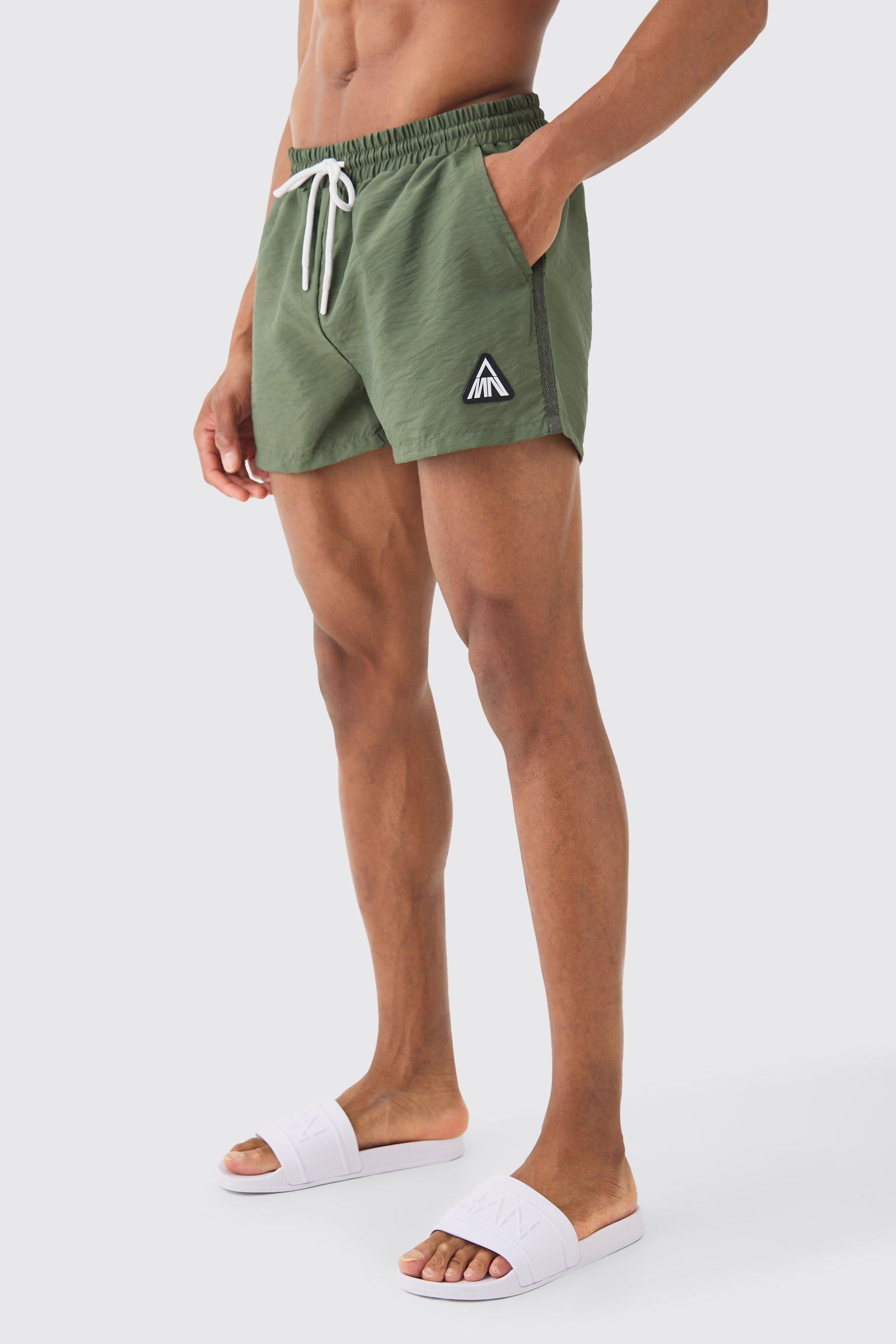Image of Super Short Man Triangle Crinkle Swim Short, Verde