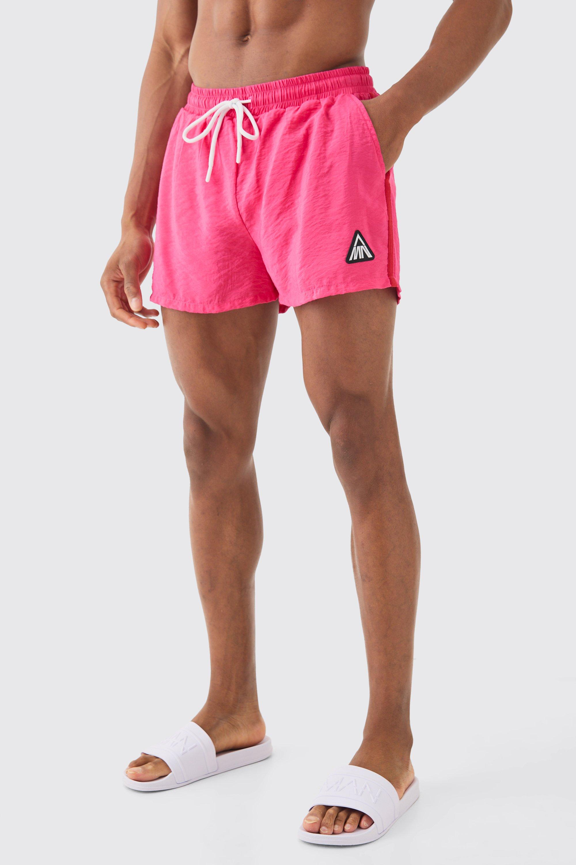 Image of Super Short Man Triangle Crinkle Swim Short, Pink