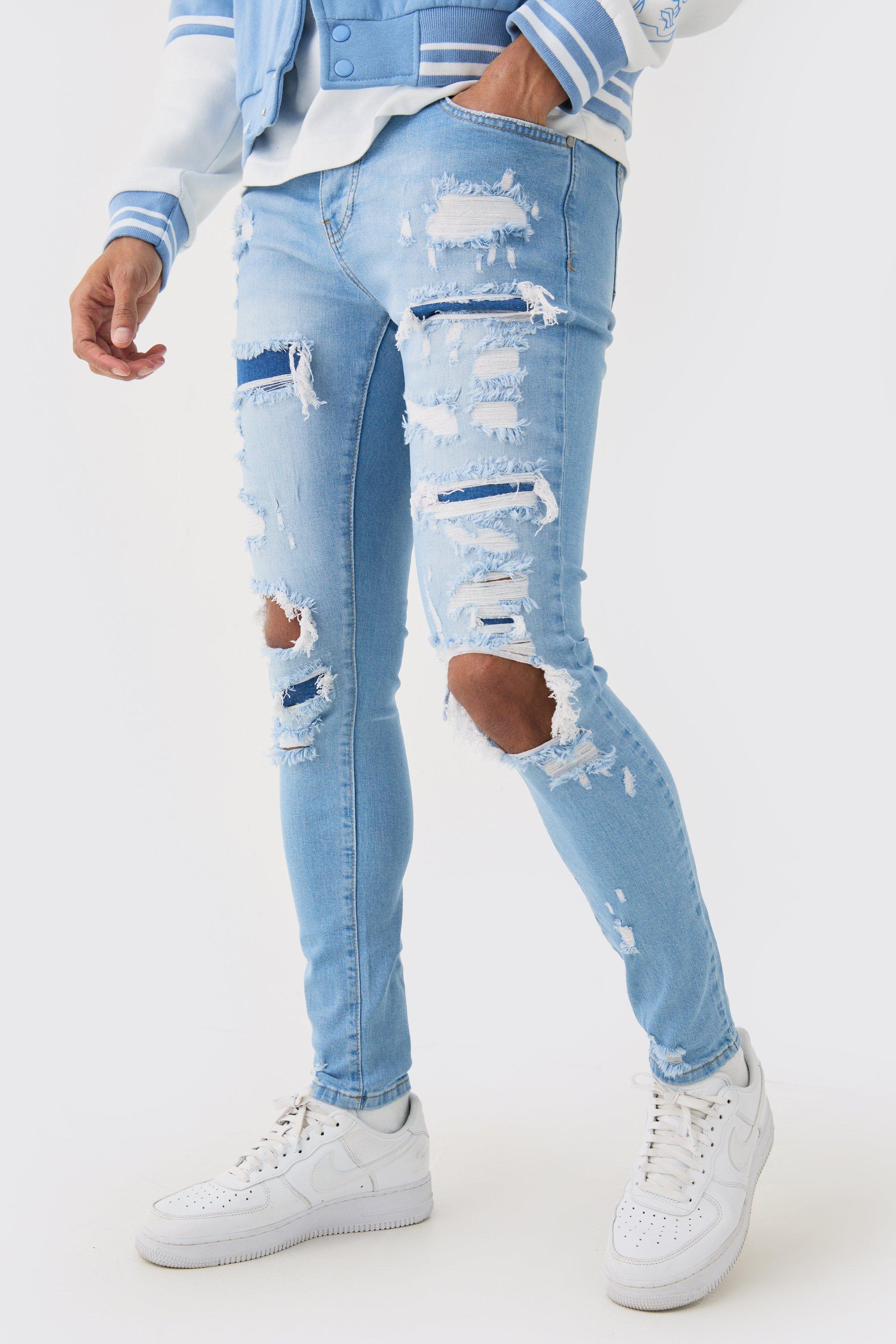 Image of Skinny Stretch All Over Rip Bleached Denim Jean In Light Blue, Azzurro