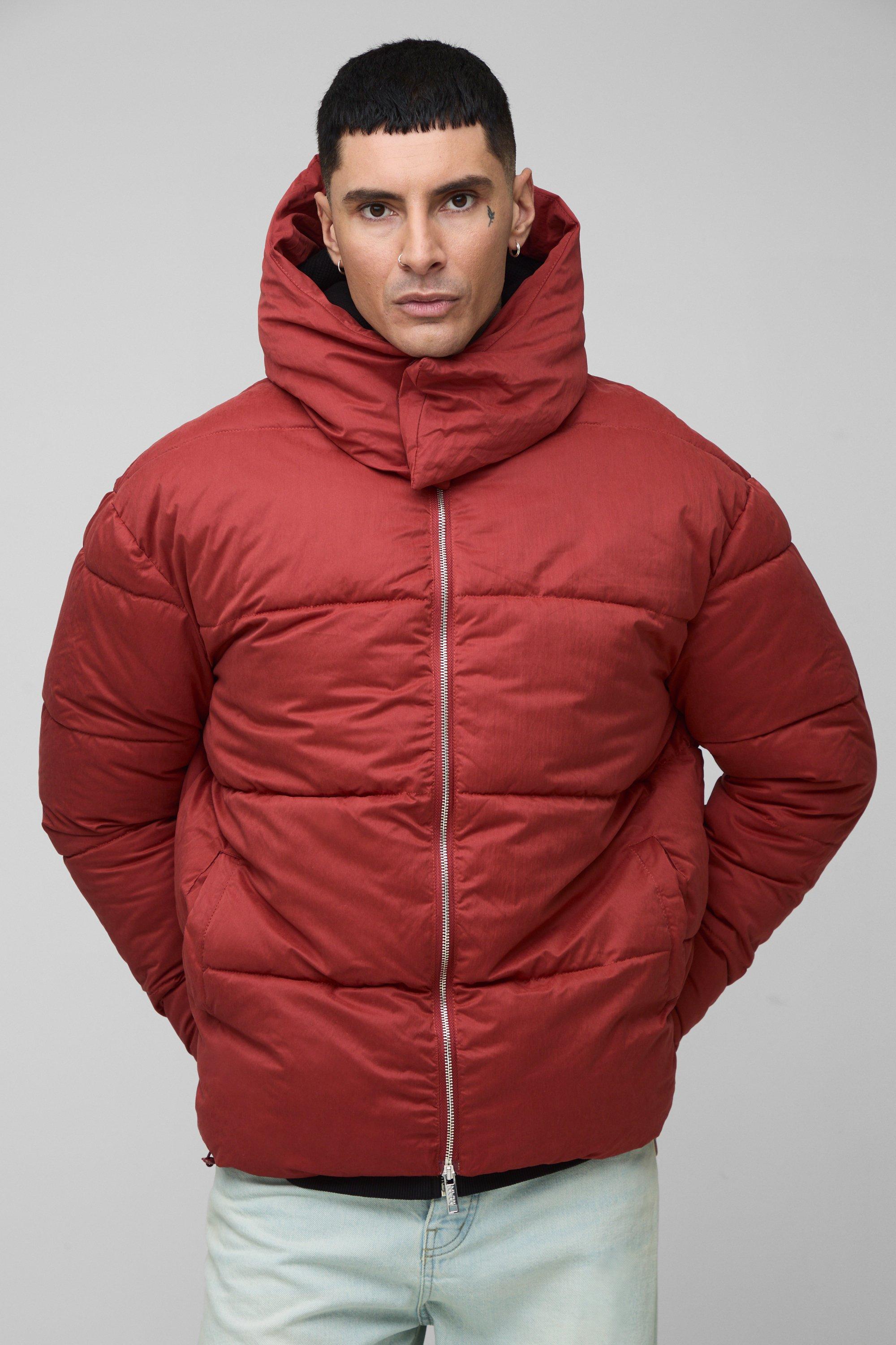 Piumino Tall squadrato color ruggine con collo a imbuto esteso e cappuccio, Arancio