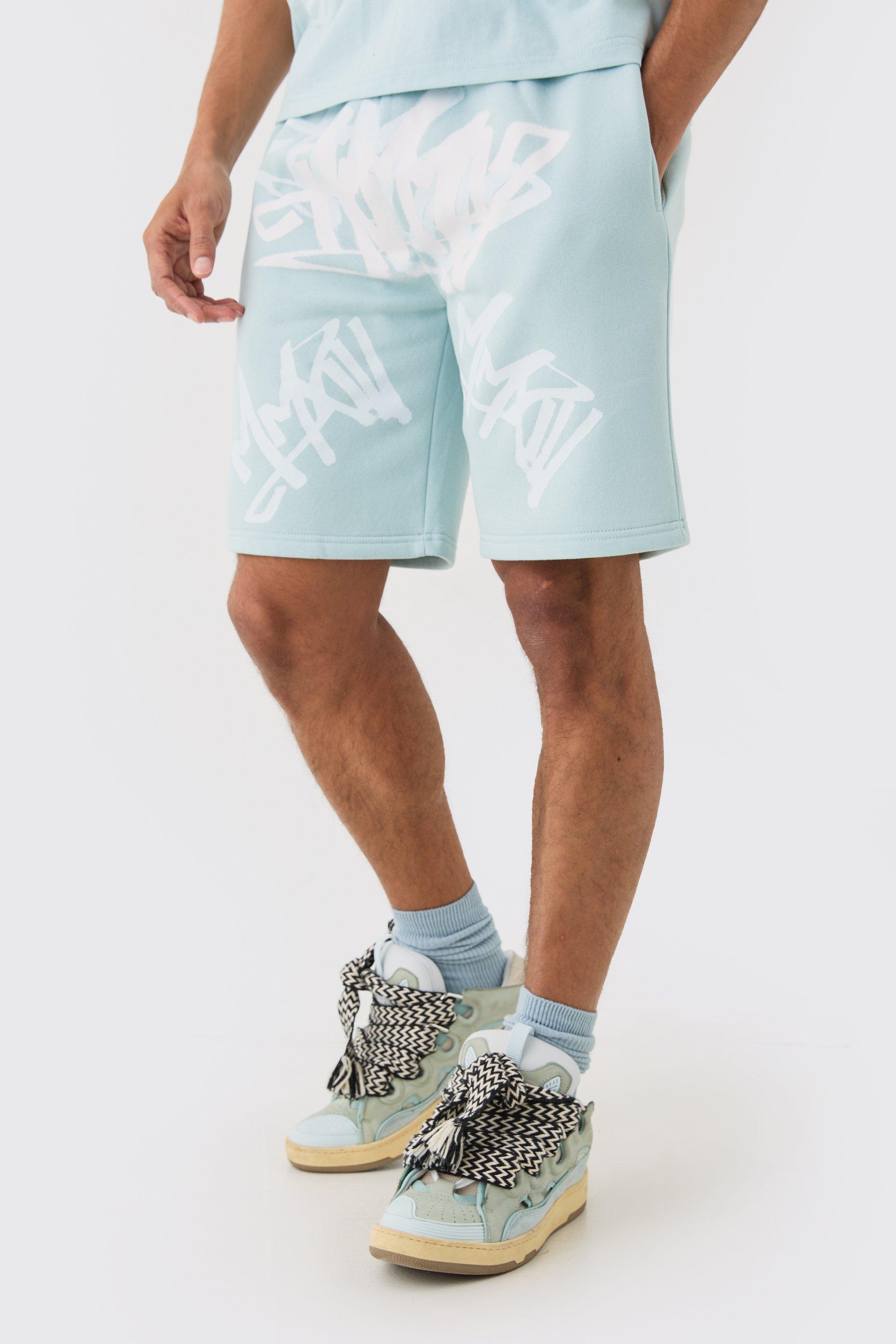 Image of Loose Fit Graffiti Printed Jersey Shorts, Azzurro