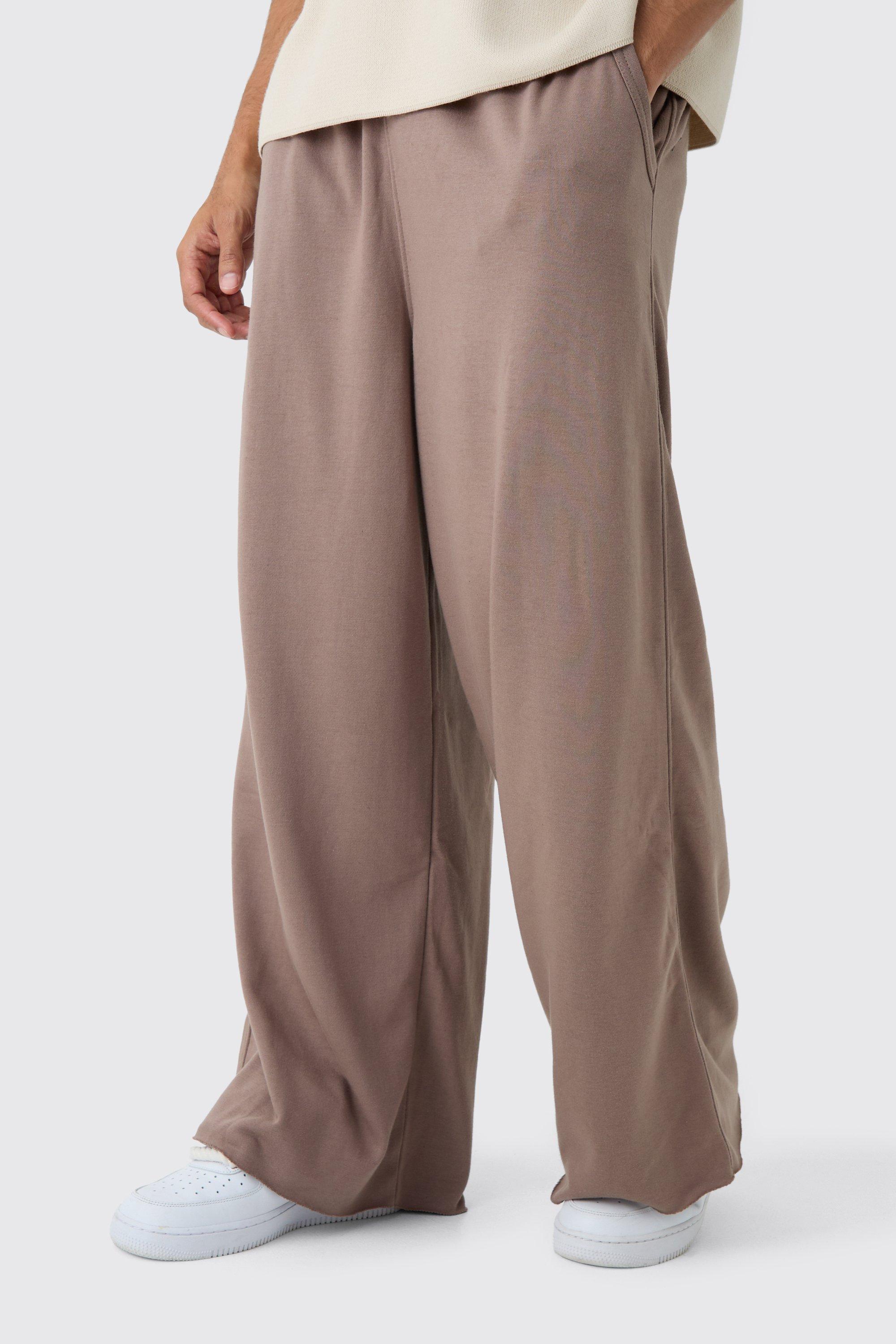 Pantaloni tuta a gamba super ampia con rovescio a ricci e fondo grezzo, Beige