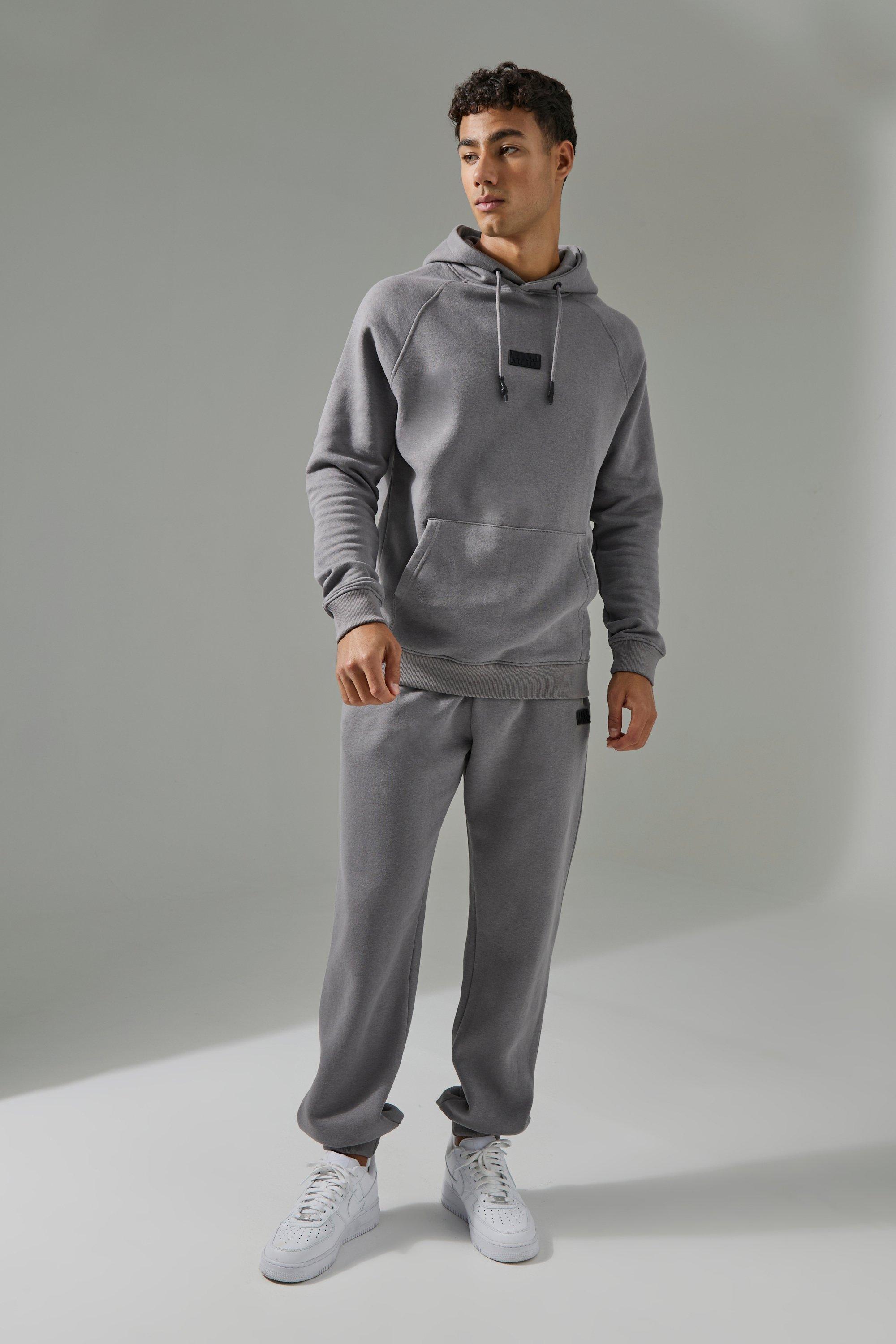 Image of Tuta sportiva con cappuccio & pantaloni tuta Man Active, Grigio
