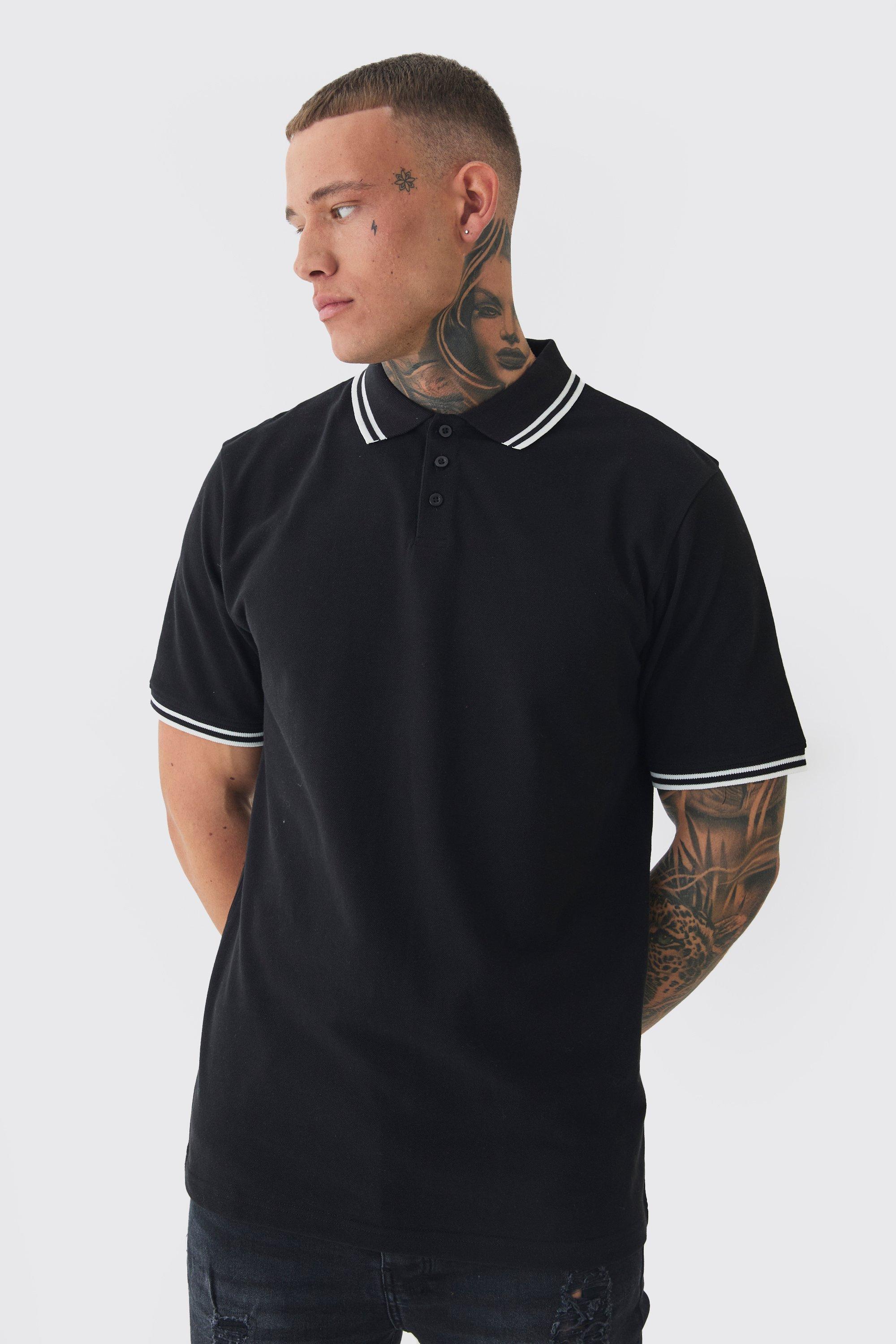 Image of Polo Tall Slim Fit in piqué di colore nero con righe a contrasto, Nero