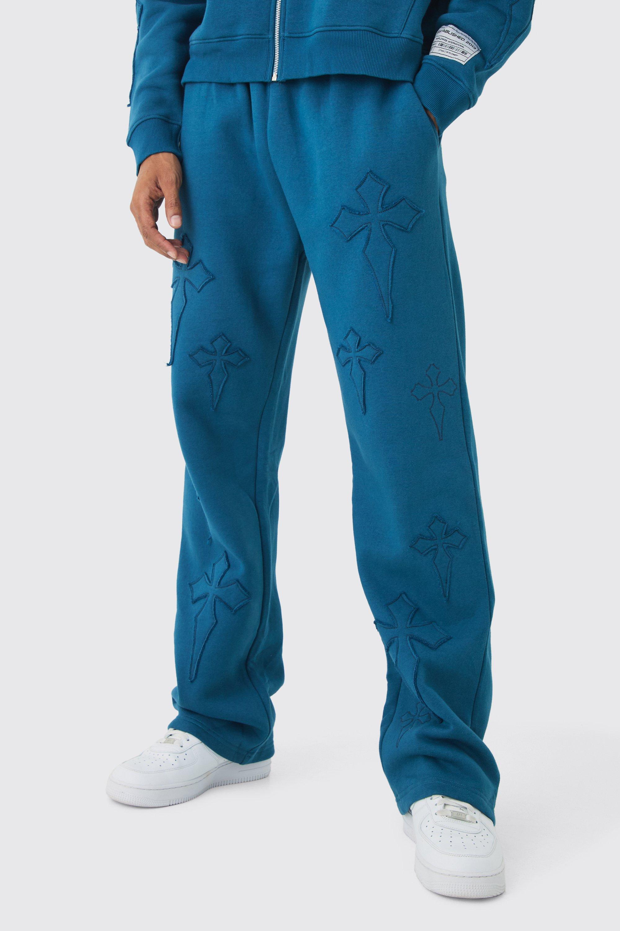 Pantaloni tuta rilassati con applique a croce, Azzurro