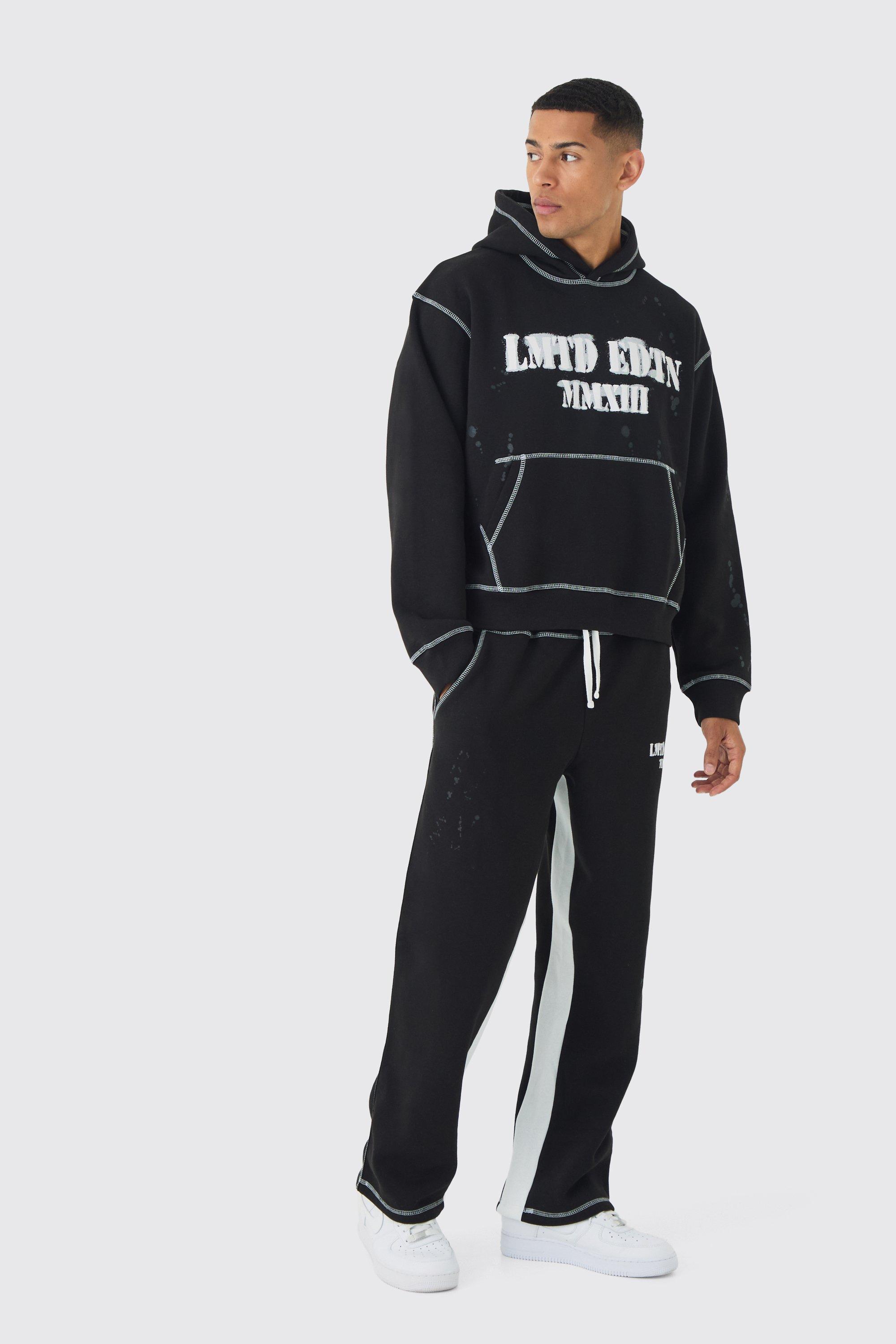 Tuta sportiva squadrata oversize con stampa di schizzi di colore e cuciture a contrasto, Nero