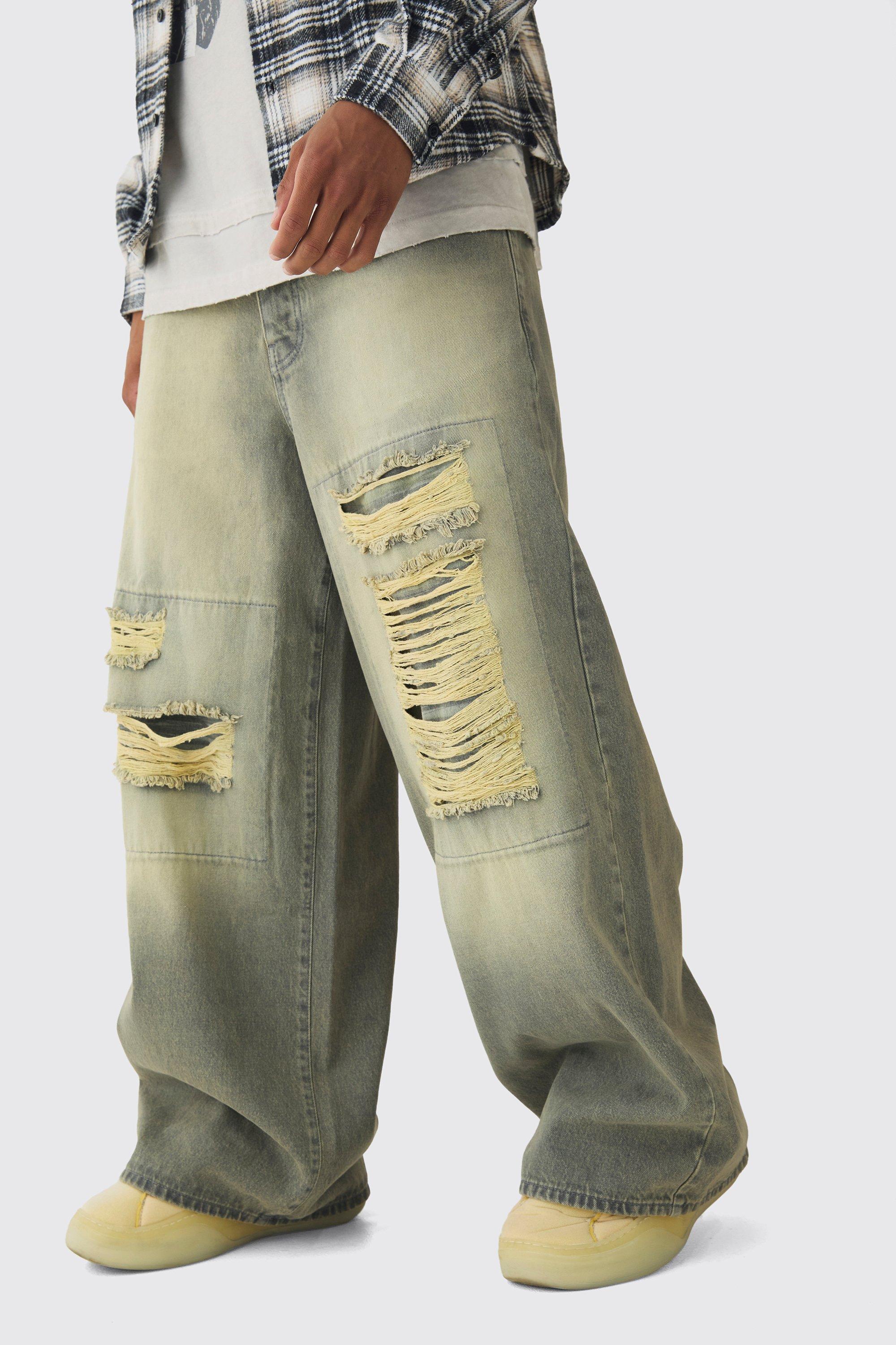 Jeans extra comodi in denim rigido con strappi, Verde