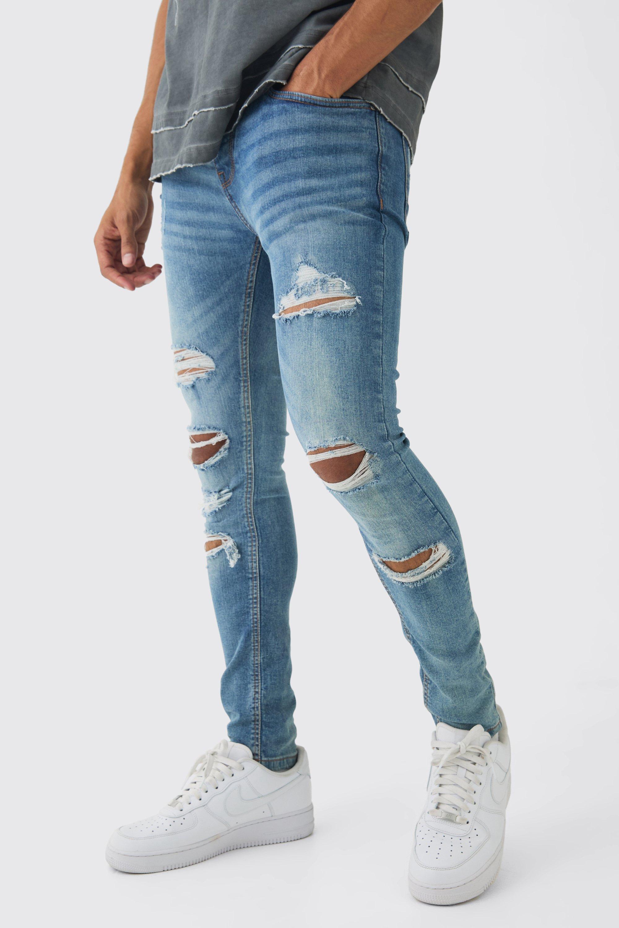 Jeans Skinny Fit con strappi all over, Azzurro