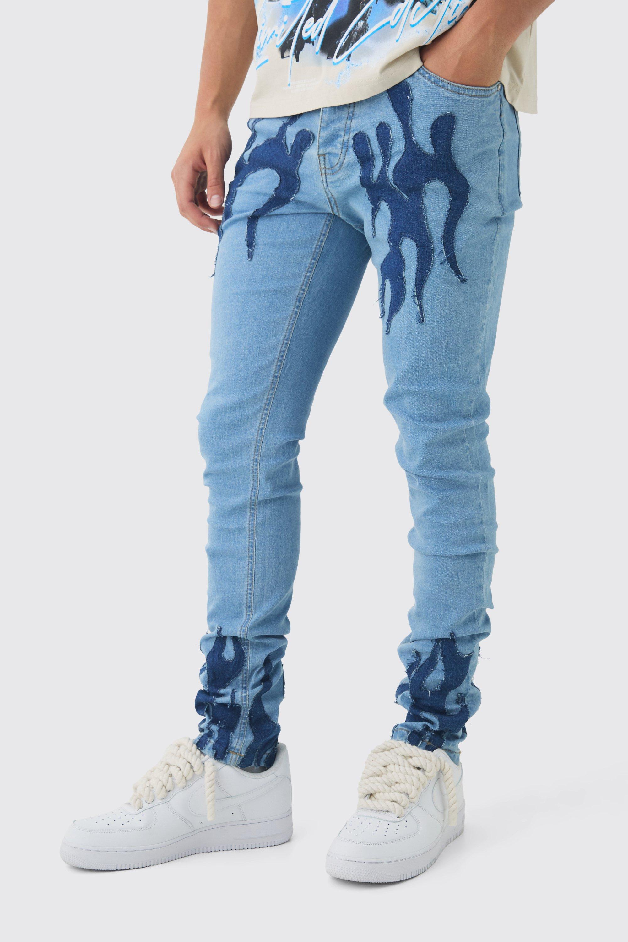 Jeans Skinny Fit in denim Stretch con applique di fiamma, pieghe sul fondo e pieghe sul fondo, Azzurro