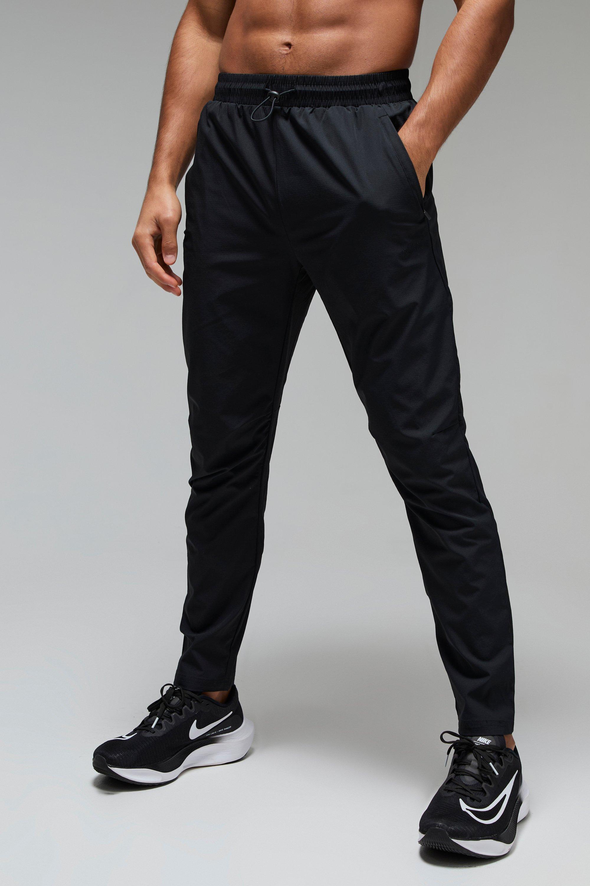 Pantaloni tuta affusolati Man Active Shower Resist, Nero