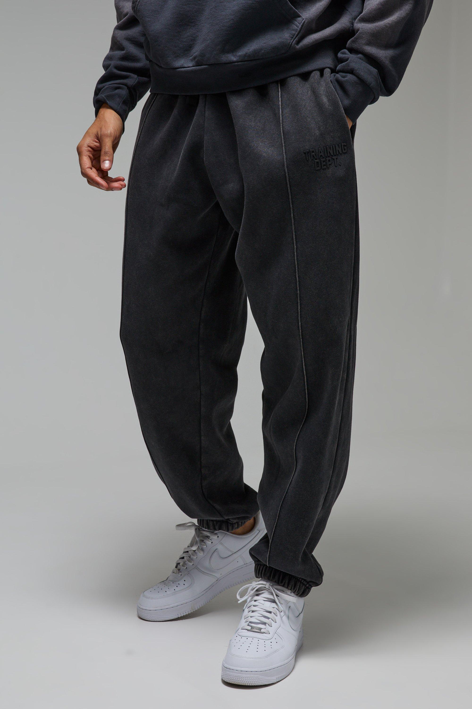 Pantaloni tuta oversize slavati Training Dept con nervature, Nero