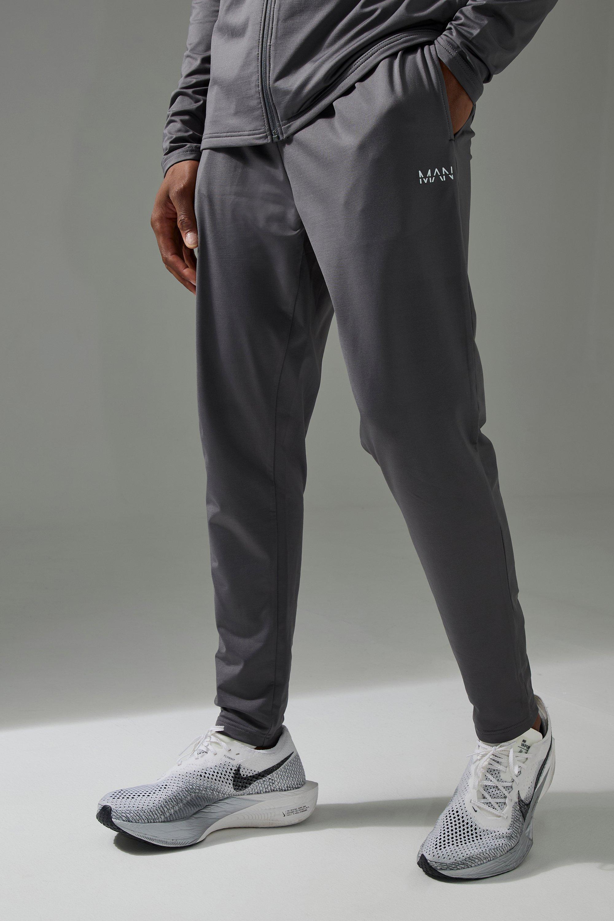 Pantaloni tuta affusolati Man Active in fleece per alta performance sul retro, Grigio
