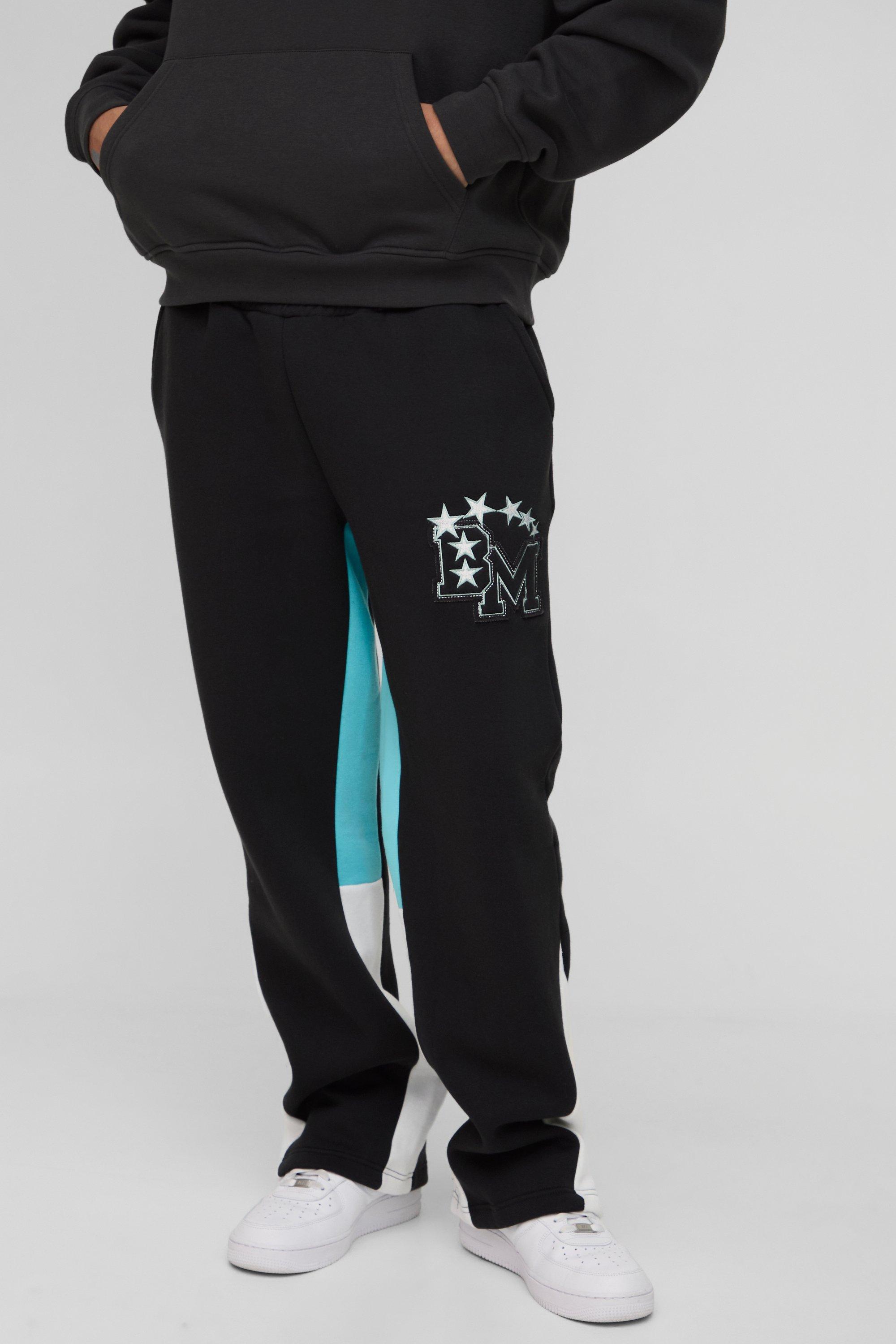 Pantaloni tuta BM stile Varsity con applique e inserti, Nero