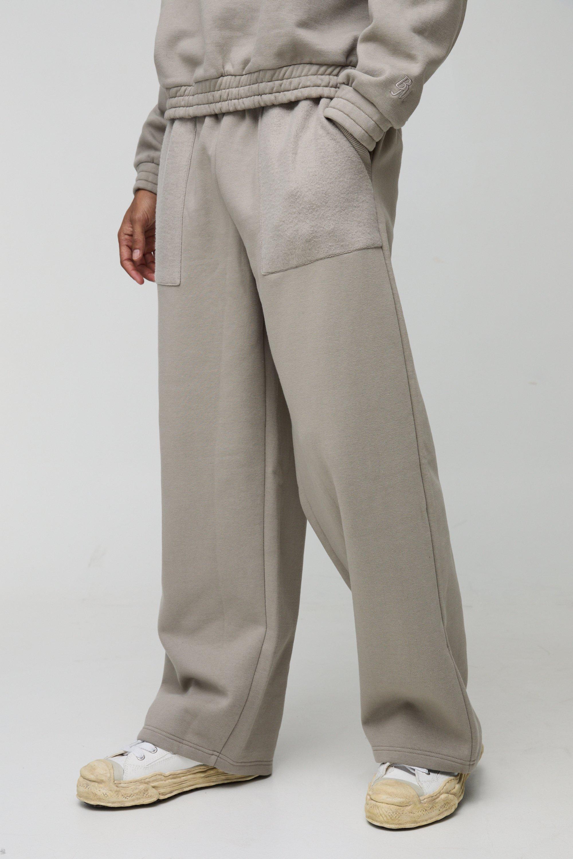 Pantaloni tuta pesanti a gamba ampia con ricami in rilievo e tasche sul retro, Beige
